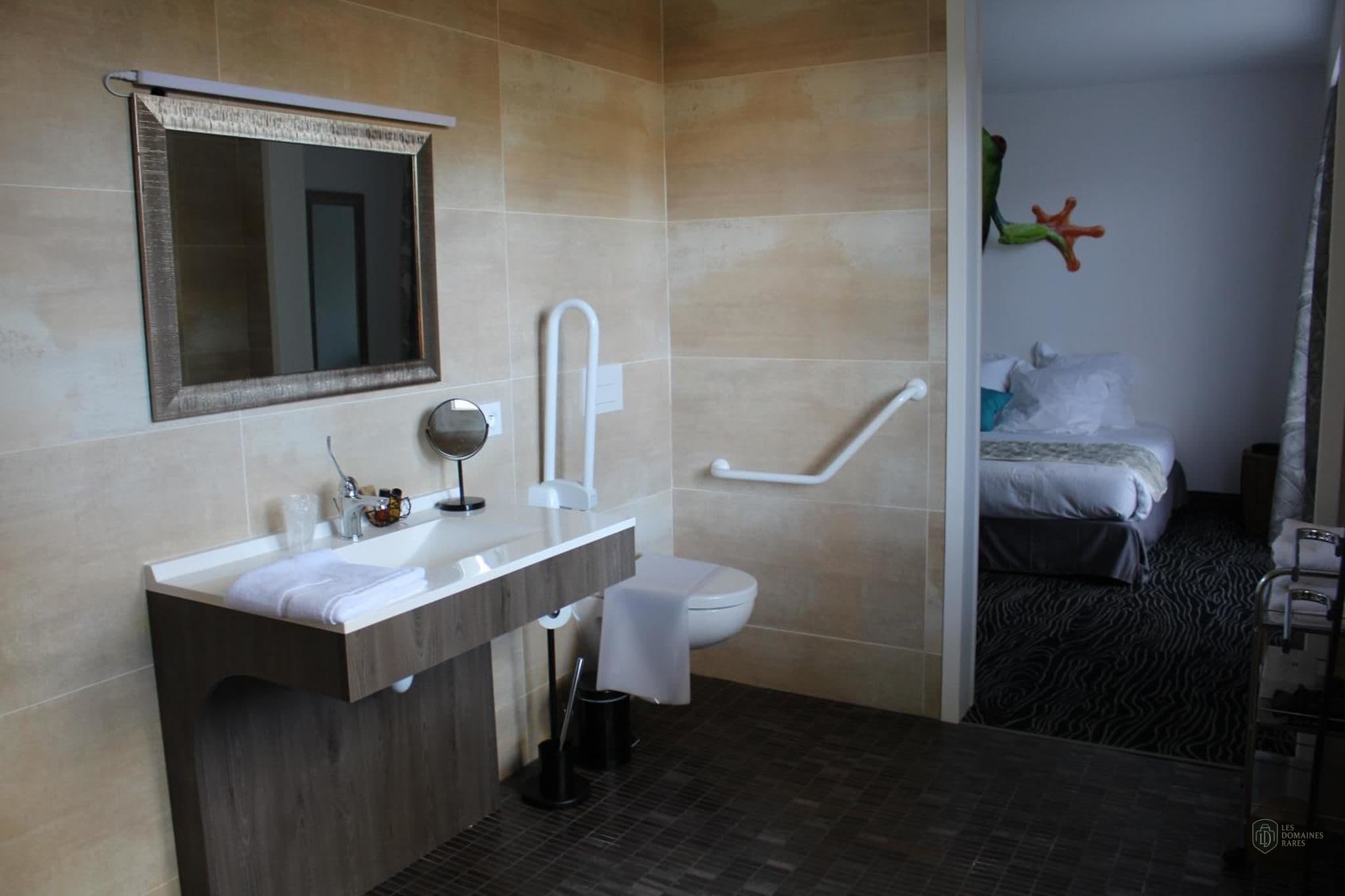 Chambre de l'hôtel Au Palmyre Hôtel à La en Nouvelle-Aquitaine