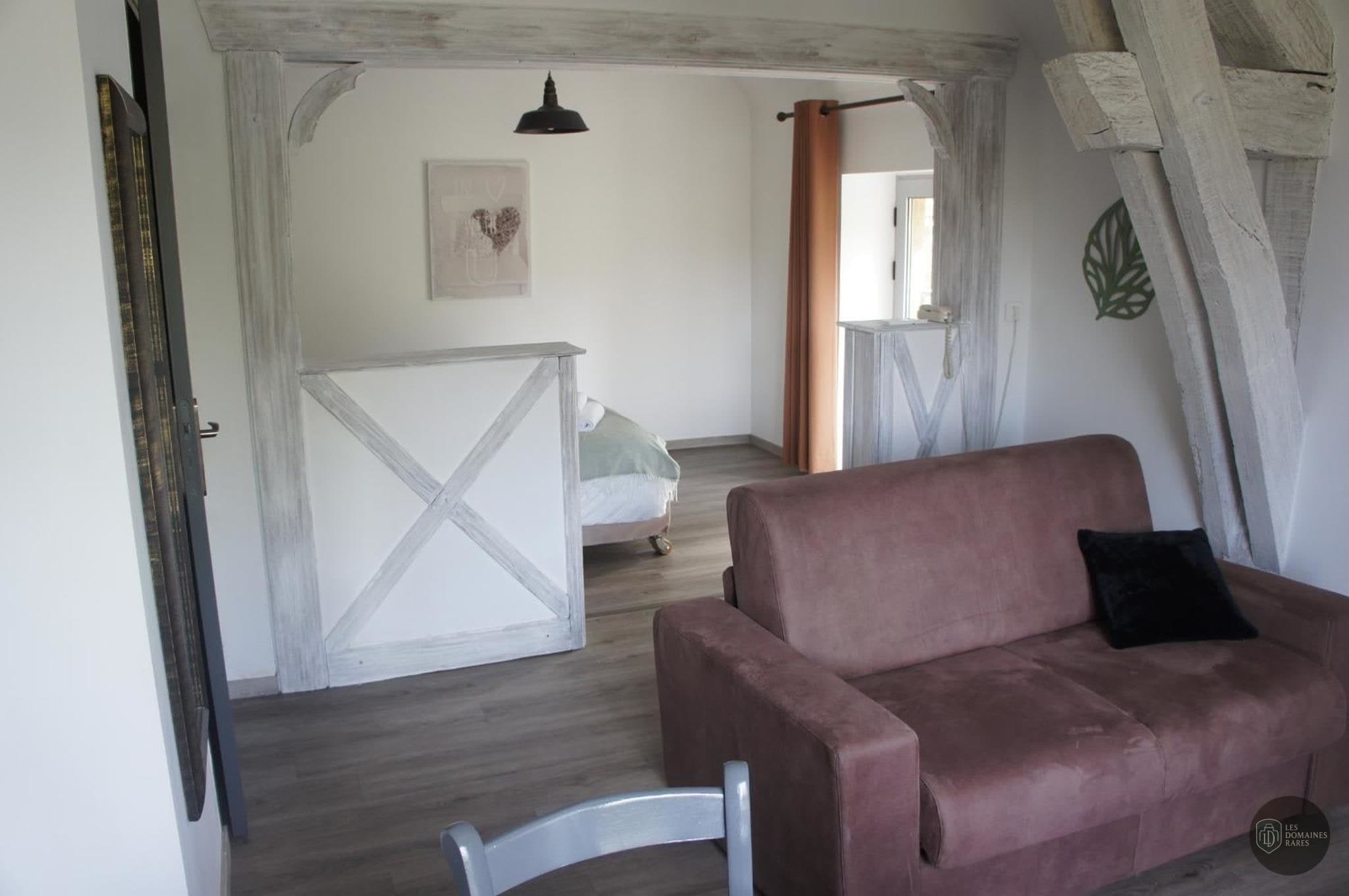 Espace intérieur de l'hôtel Auberge de Cartassac à Sarrazac en Occitanie