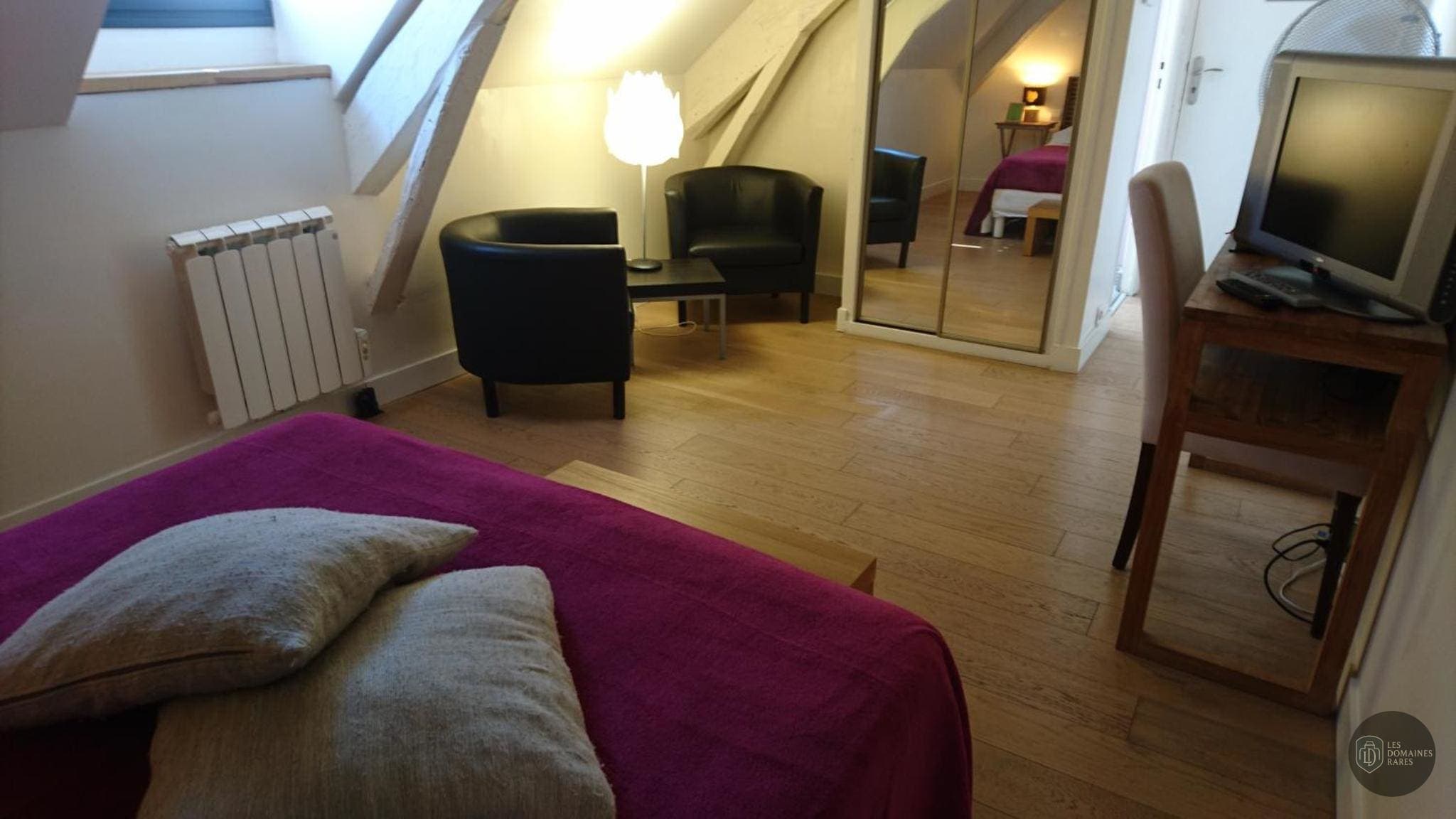 Chambre de l'hôtel Bastie d'Urfé à Naussac en Occitanie