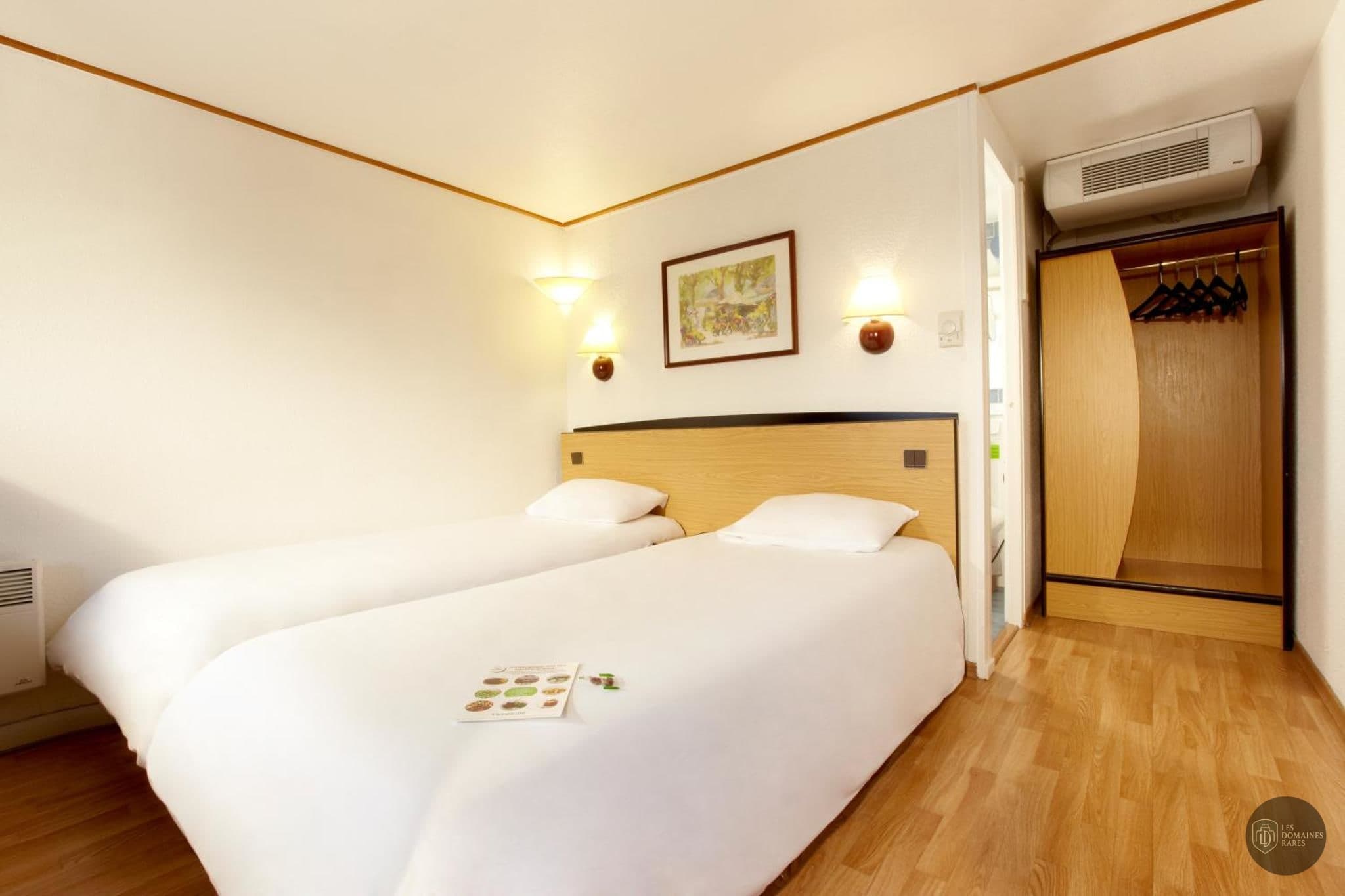 Chambre de l'hôtel Campanile Saintes à Saintes en Nouvelle-Aquitaine
