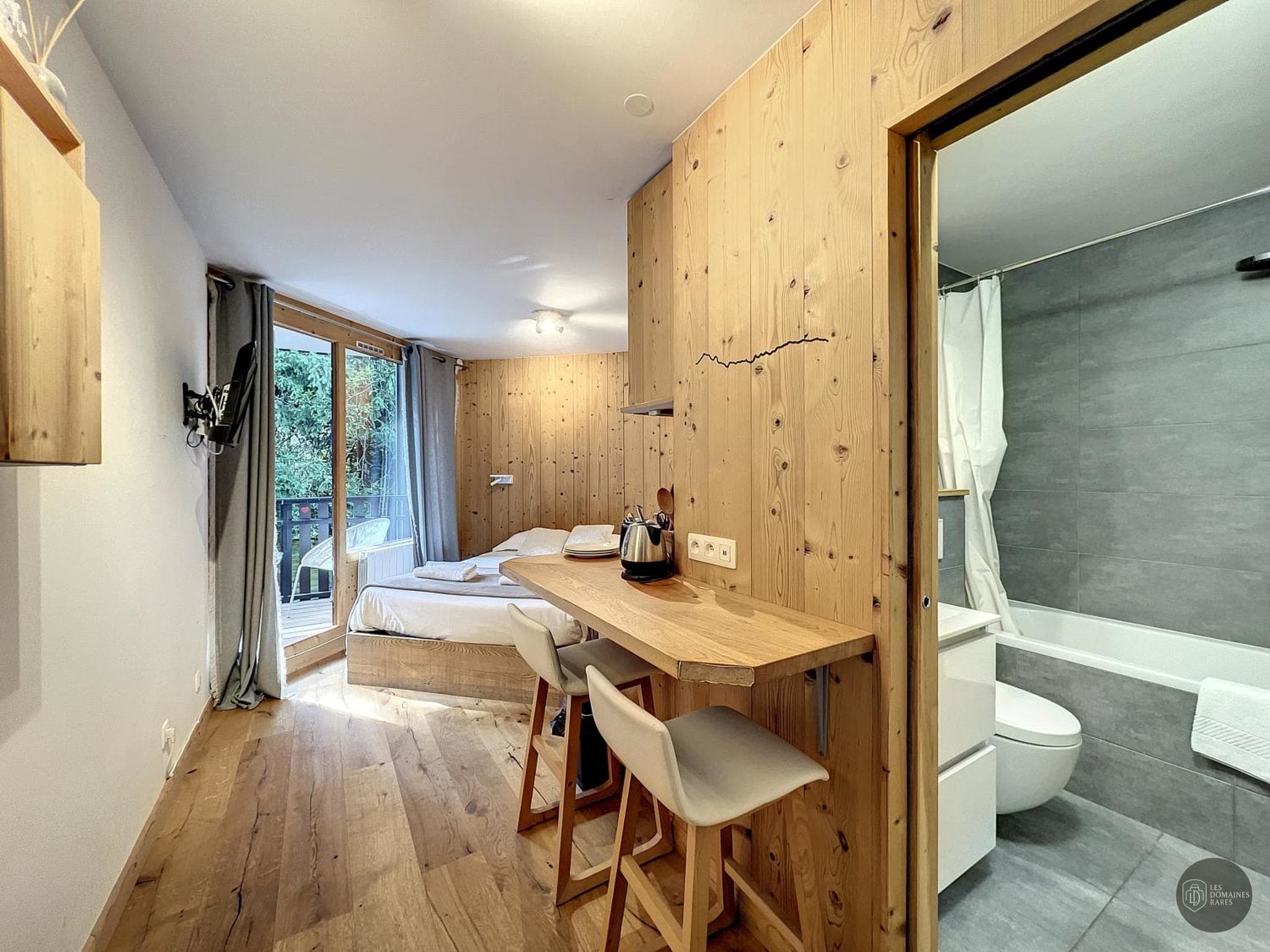 Chambre de l'hôtel Caribou à Chassagny en Auvergne-Rhône-Alpes