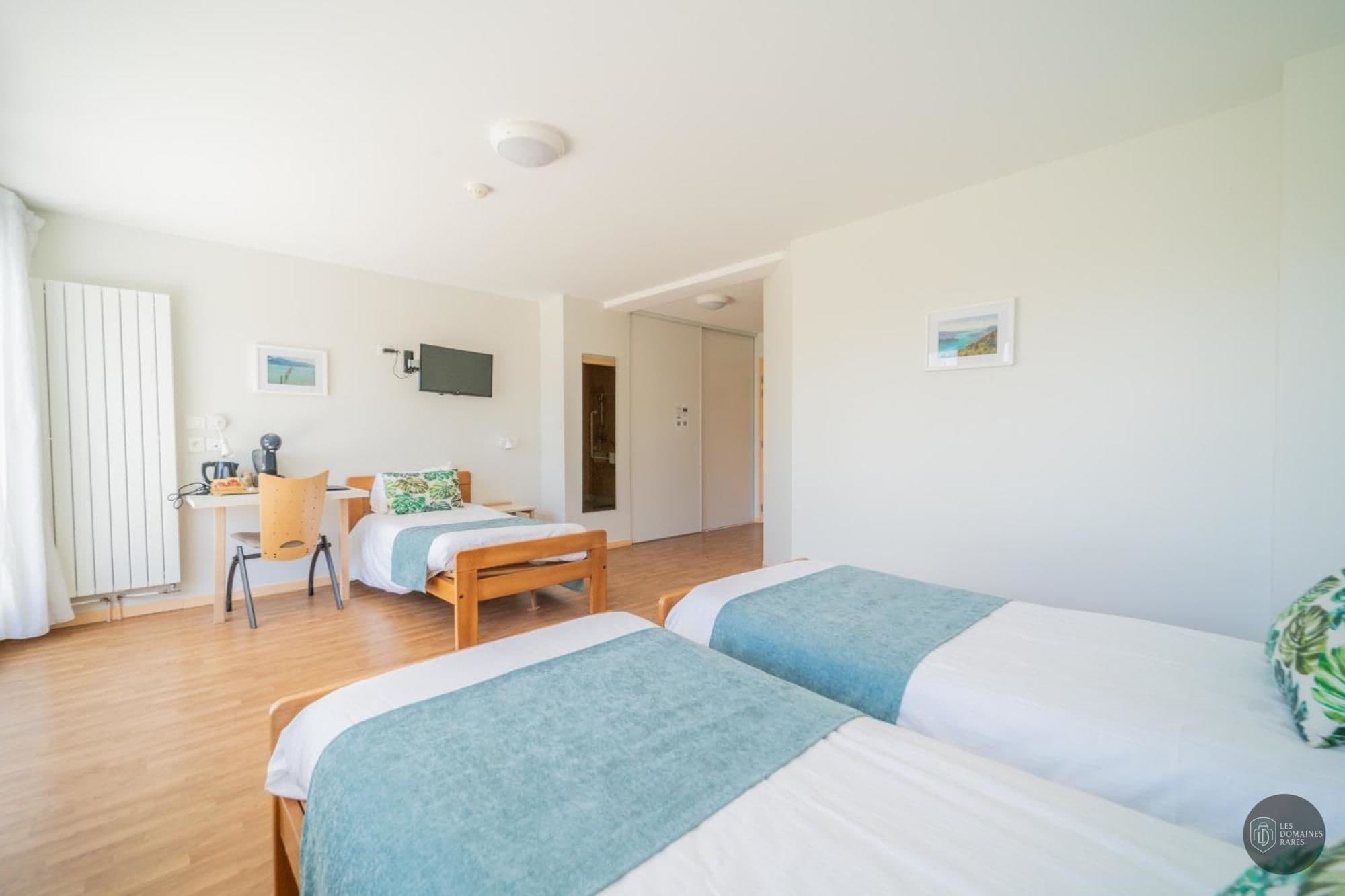 Chambre de l'hôtel Centre Jean XXIII en Auvergne-Rhône-Alpes - séminaire haute-savoie