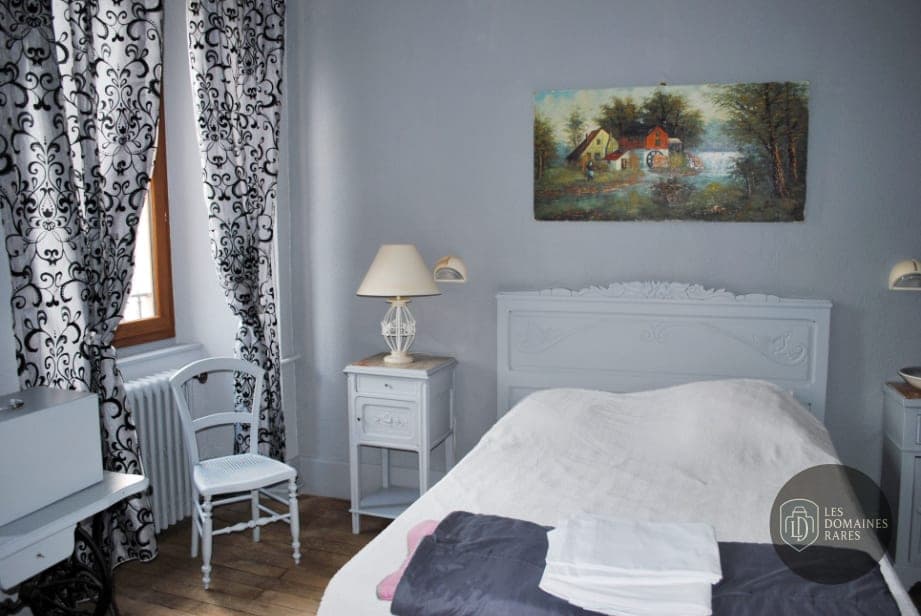 Chambre du château Château de Calmels en Occitanie - séminaire lacaune