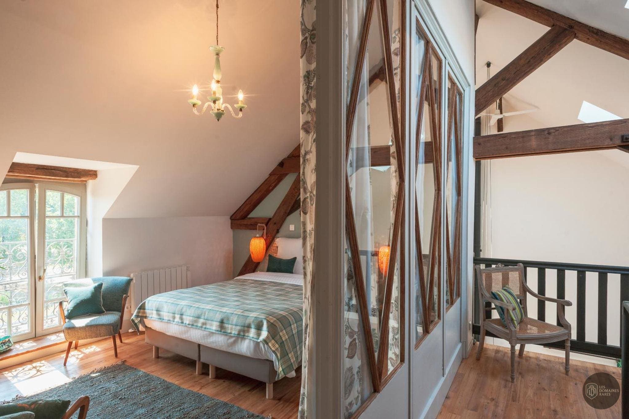 Chambre du moulin Chai du Château d'Eyran en Nouvelle-Aquitaine - séminaire gironde