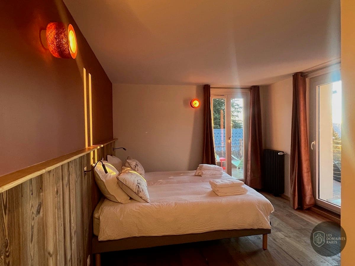 Chambre du domaine Domaine de Rozan en Auvergne-Rhône-Alpes - séminaire sarcenas