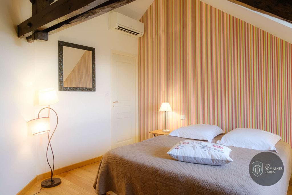 Chambre du domaine Domaine des Gauliers à Terranjou en Pays de la Loire - séminaire bonnezeaux, france