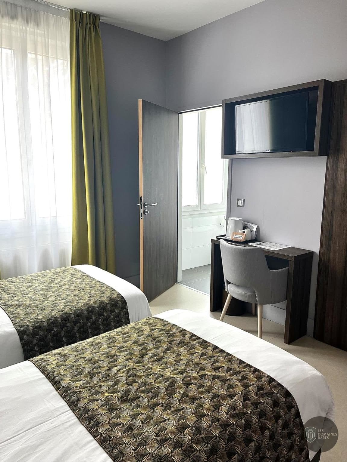 Chambre de l'hôtel Enclos Rey à Paris en Île-de-France - séminaire paris france coordonnées gps latitude : 48.846416
