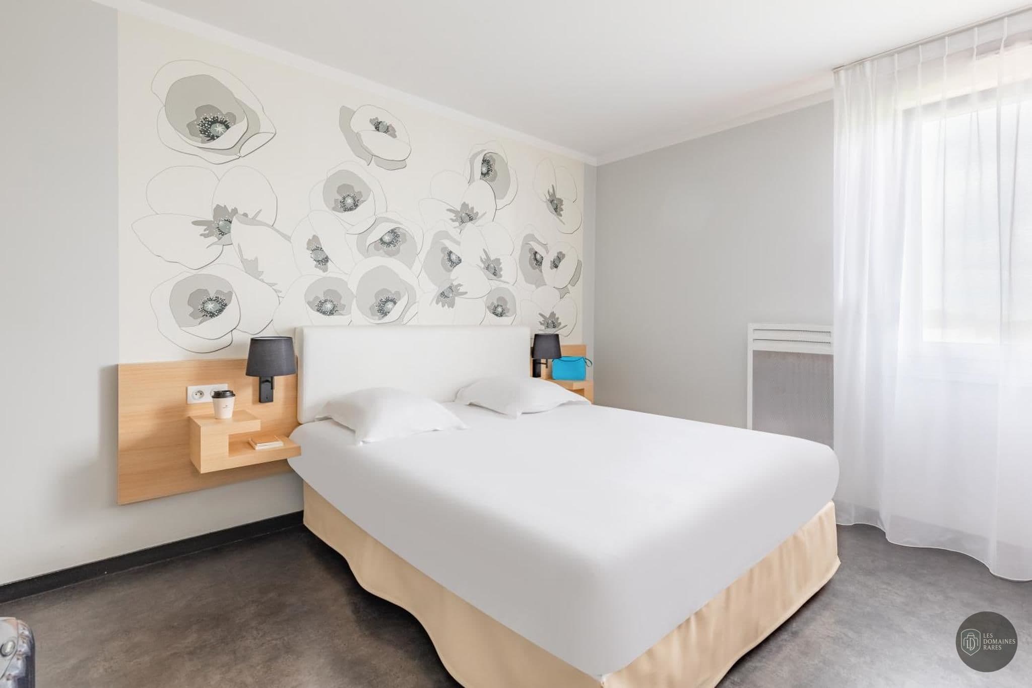 Vue extérieure de l'hôtel Golf de Reims à Gueux en Grand Est