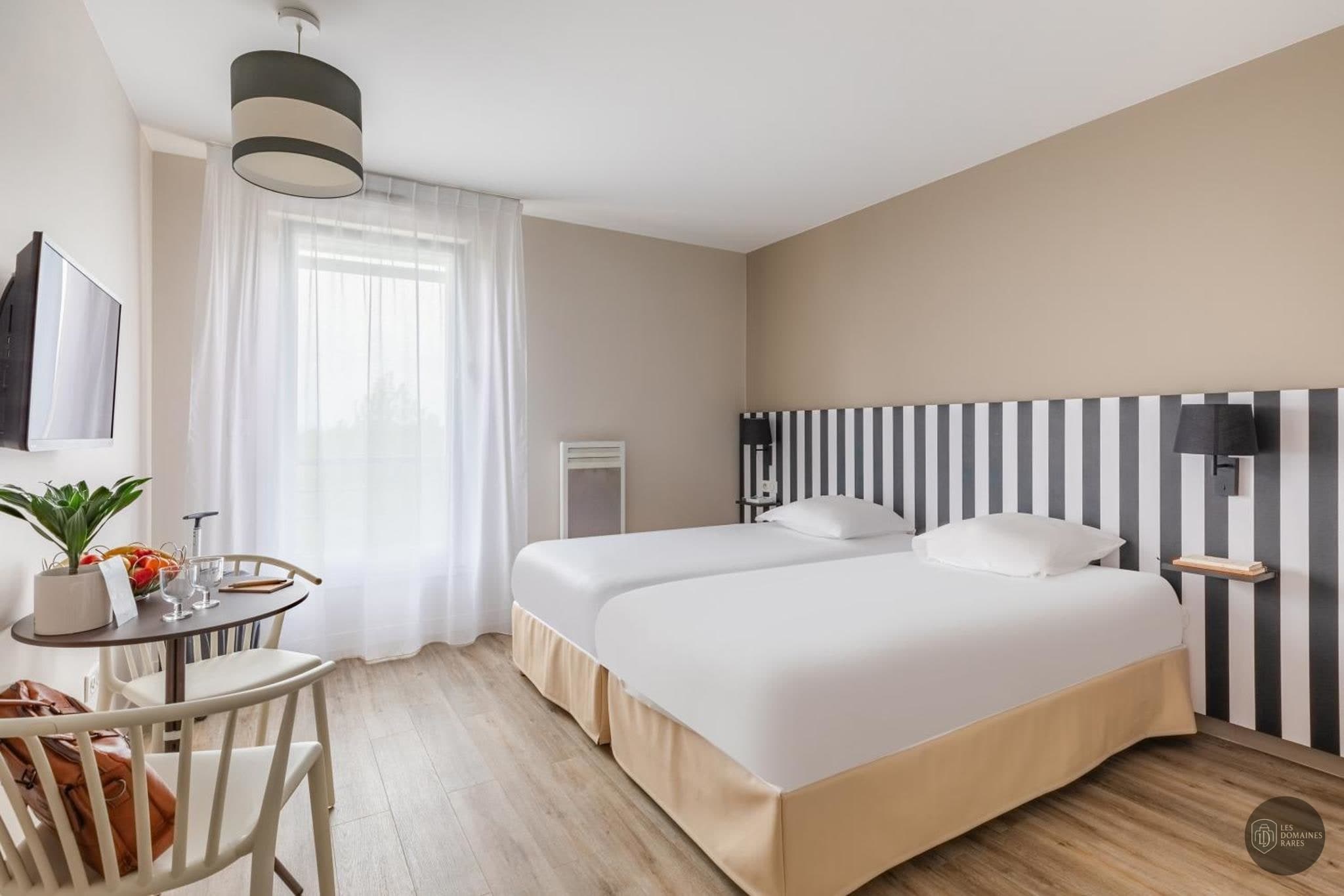 Vue extérieure de l'hôtel Golf de Reims à Gueux en Grand Est