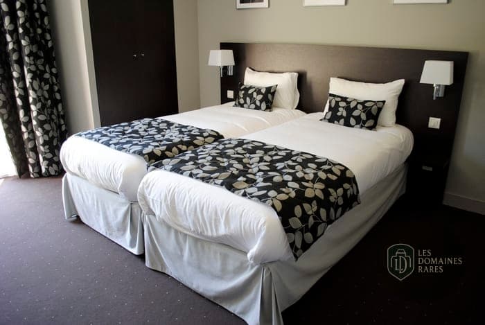 Chambre avec deux lits simples