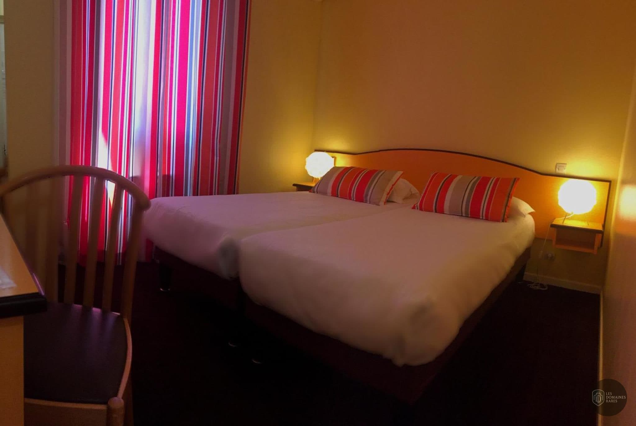Chambre de l'hôtel Hôtel Arc en Ciel en Auvergne-Rhône-Alpes