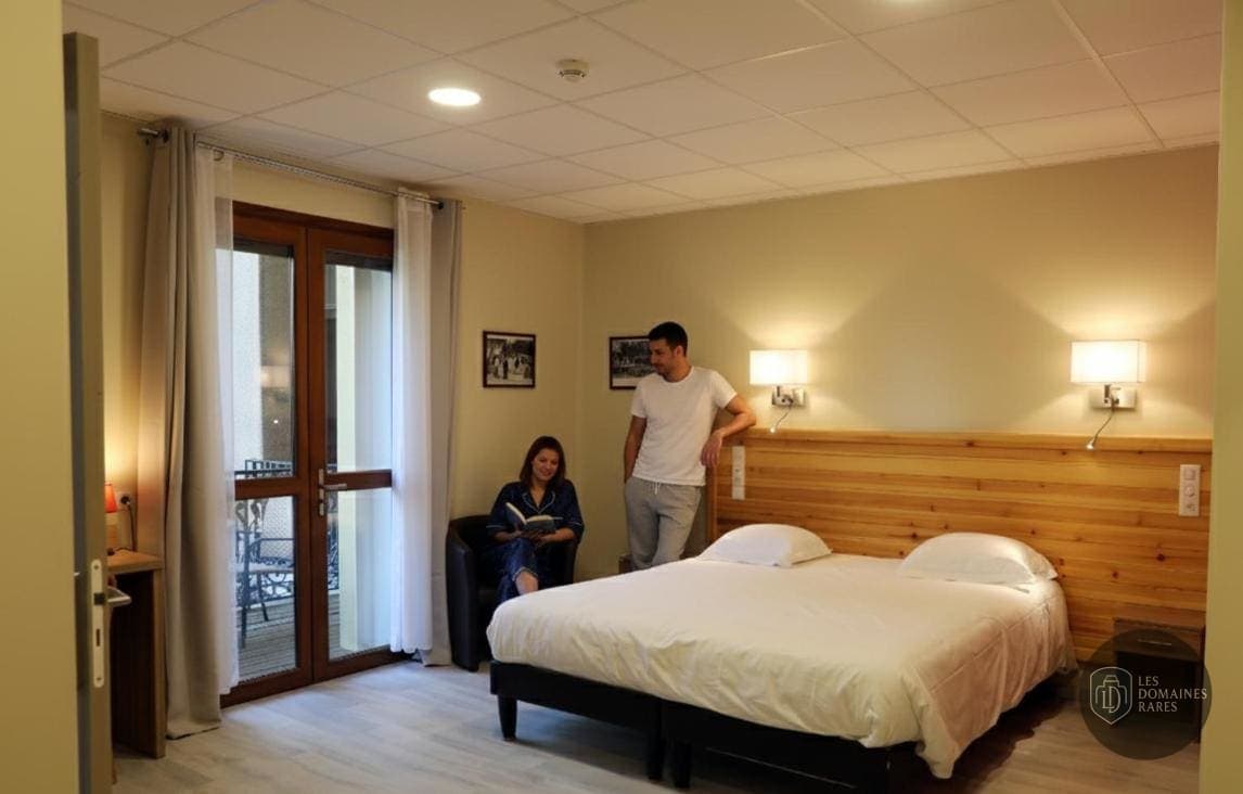 Chambre de l'hôtel Hôtel Belleville à Belleville en Auvergne-Rhône-Alpes - séminaire belleville-en-beaujolais