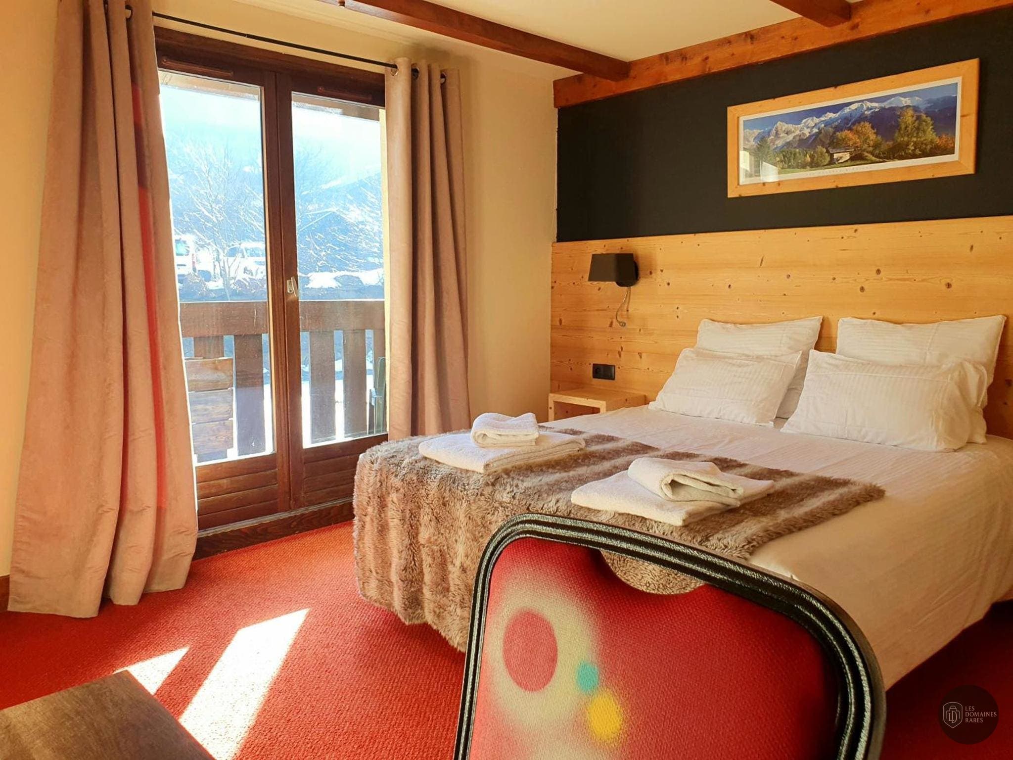 Chambre de l'hôtel Hôtel Chalet du Bois à Les en Auvergne-Rhône-Alpes - séminaire haute-savoie