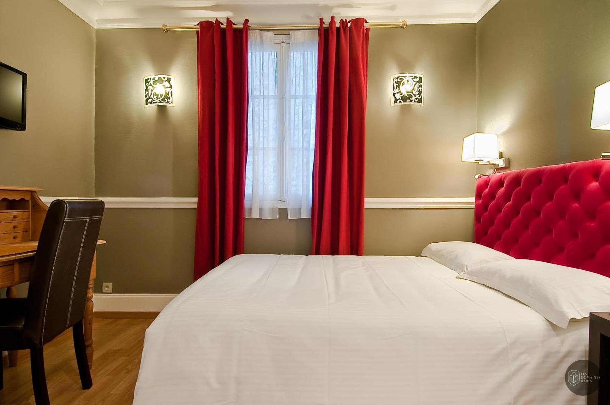 Chambre de l'hôtel Hôtel Claude Bernard à Paris en Île-de-France