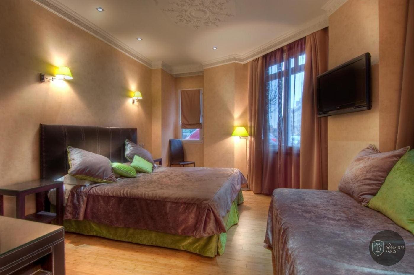 Chambre de l'hôtel Hôtel Claude Bernard à Paris en Île-de-France