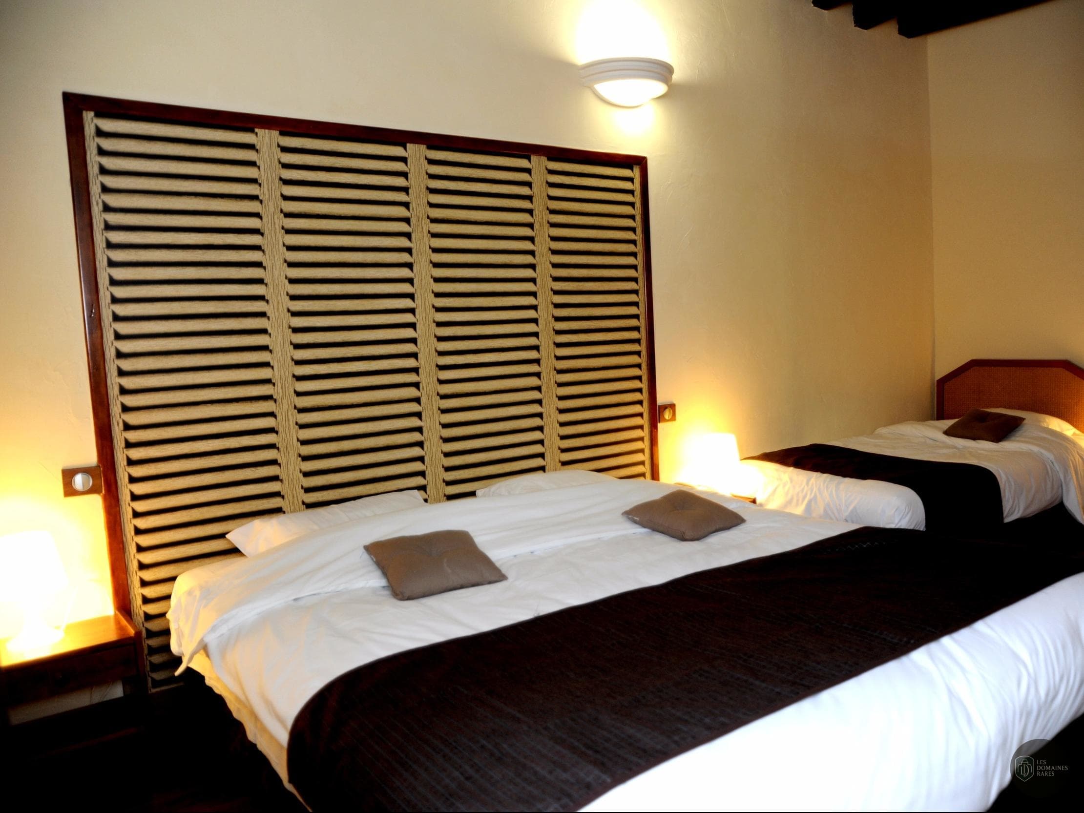 Chambre de l'hôtel Hôtel Ecu de France à Malesherbes en Centre-Val de Loire