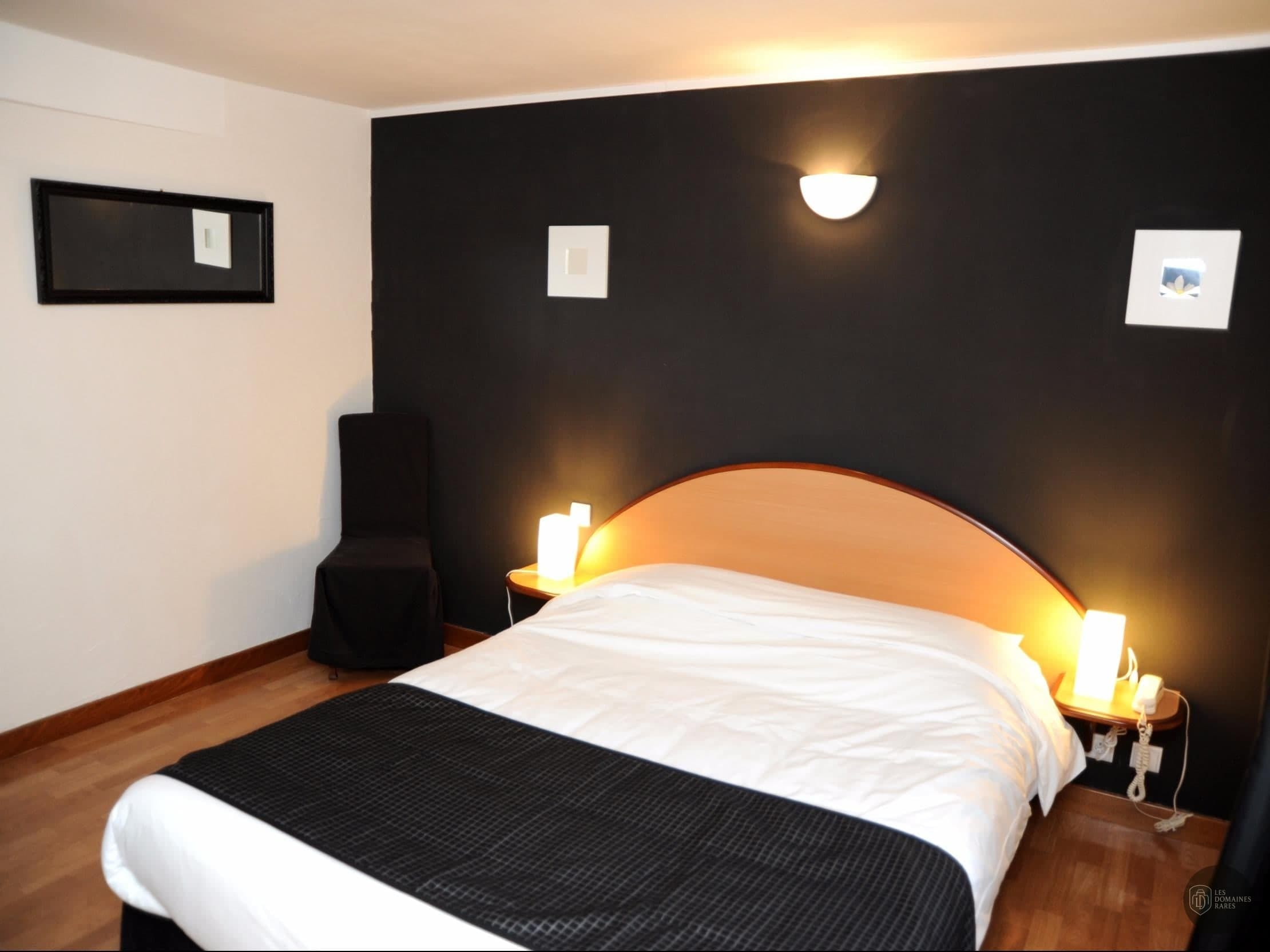 Chambre de l'hôtel Hôtel Ecu de France à Malesherbes en Centre-Val de Loire