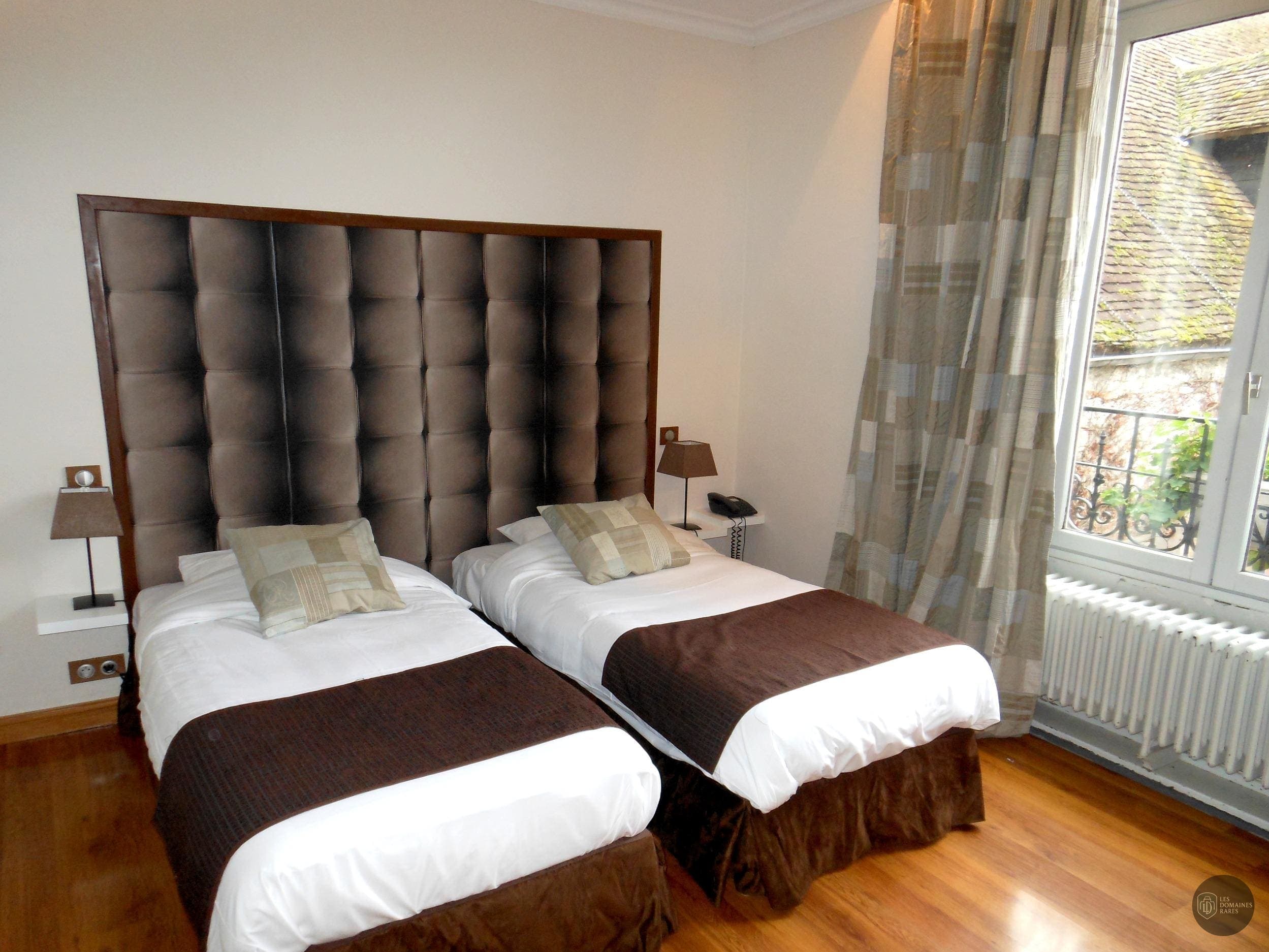 Chambre de l'hôtel Hôtel Ecu de France à Malesherbes en Centre-Val de Loire