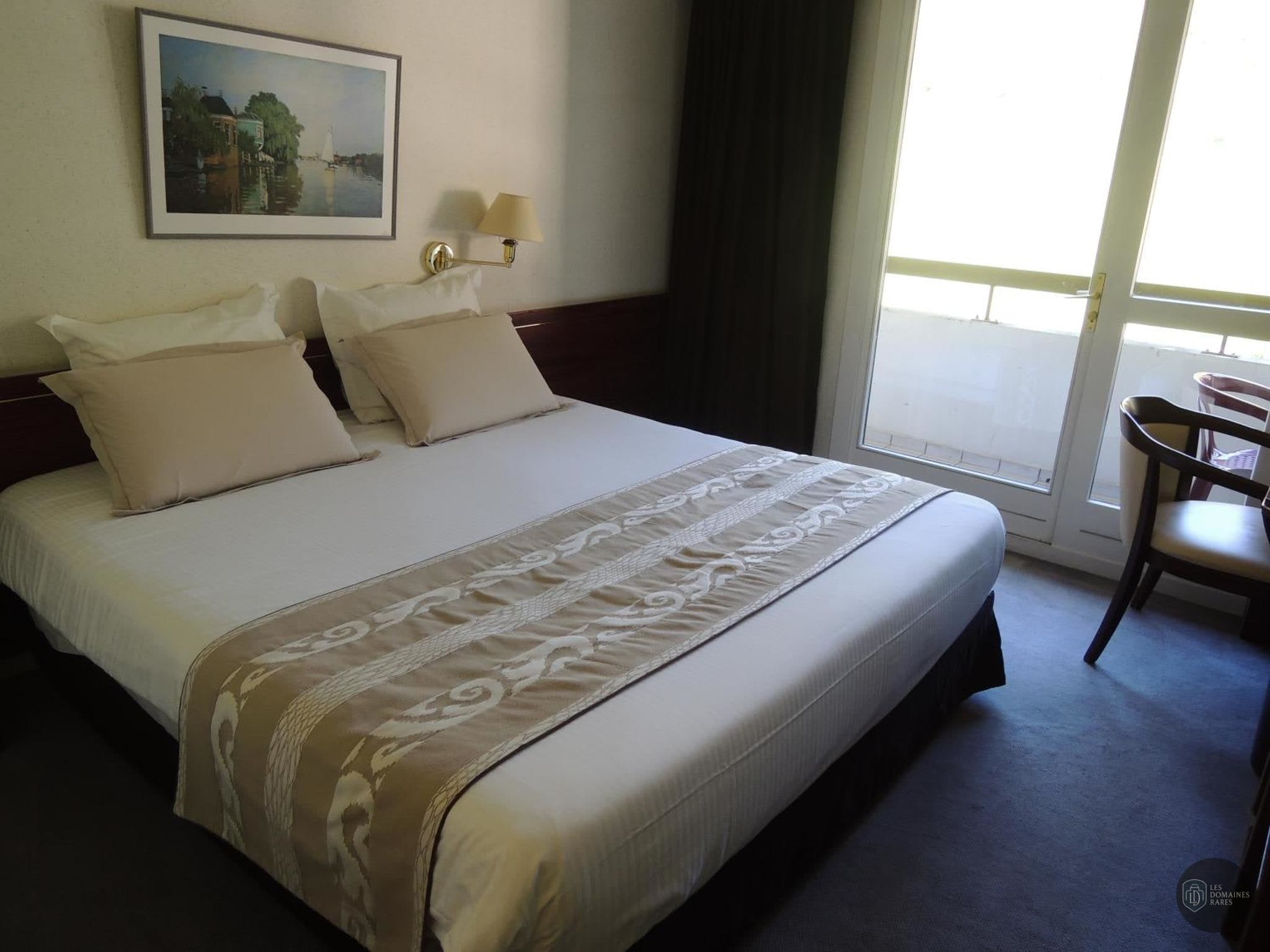 Chambre de l'hôtel Hôtel Le 4C à Cluses en Auvergne-Rhône-Alpes