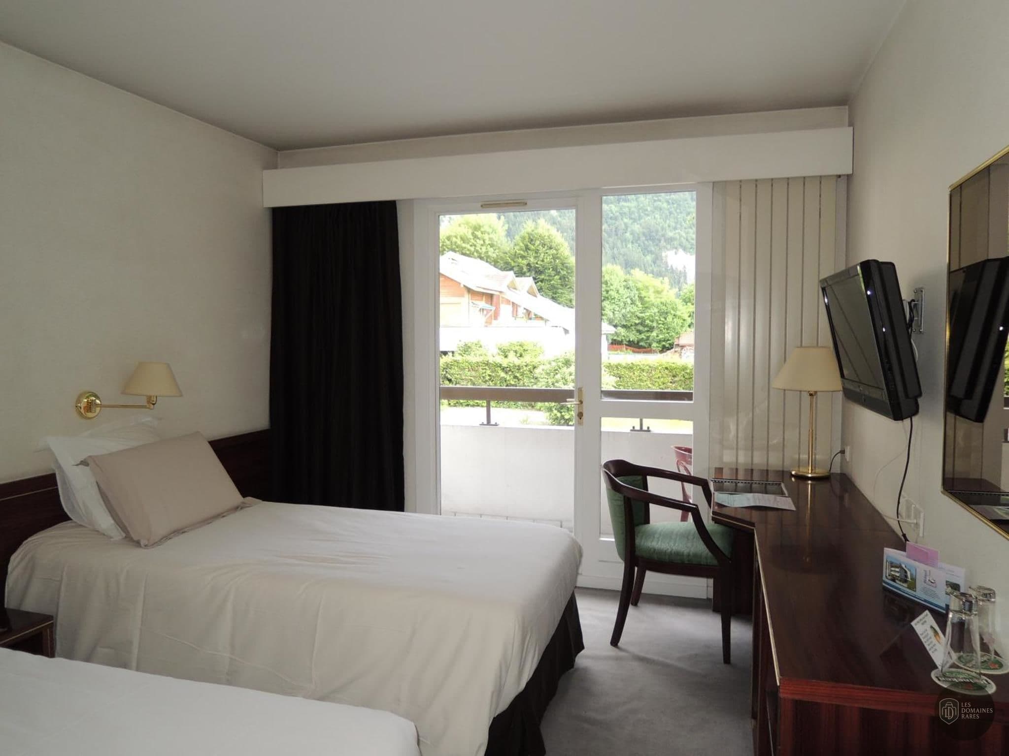 Chambre de l'hôtel Hôtel Le 4C à Cluses en Auvergne-Rhône-Alpes