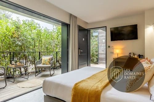 Chambre de l'hôtel Hôtel Le Lodge à Ondres en Nouvelle-Aquitaine