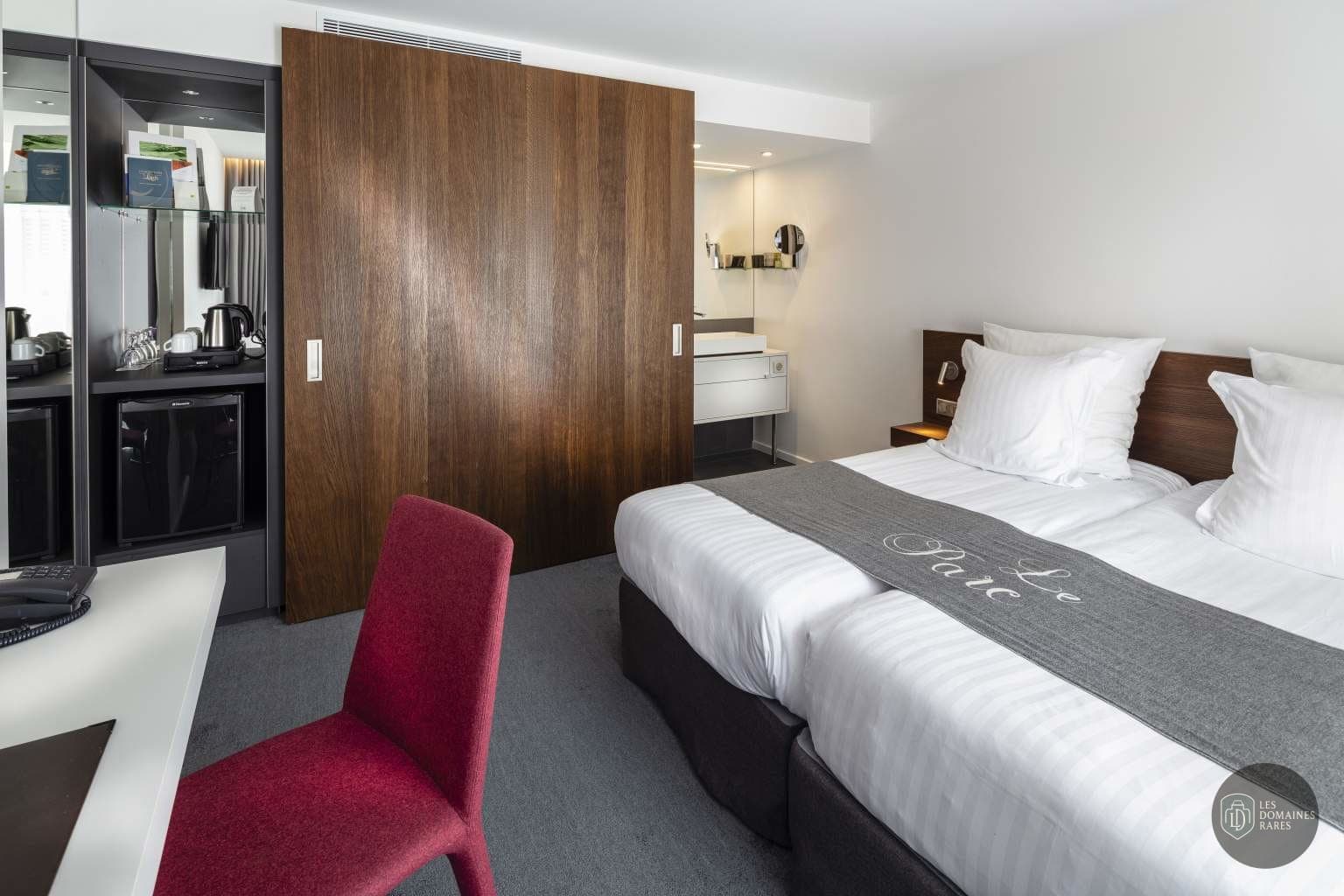 Chambre de l'hôtel Hôtel Le Parc en Grand Est