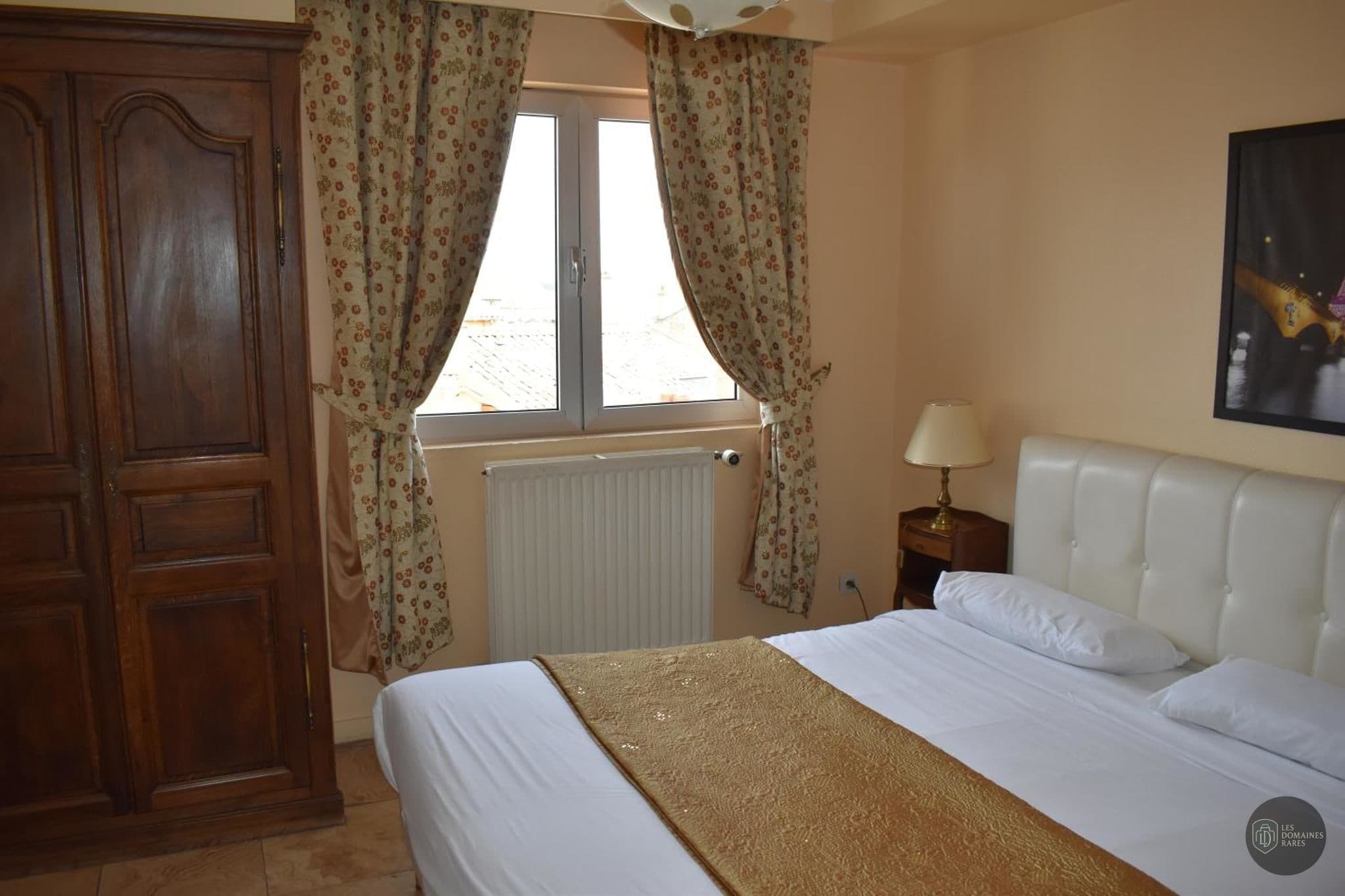 Chambre de l'hôtel Hôtel Le Sauvage à Besançon en Bourgogne-Franche-Comté