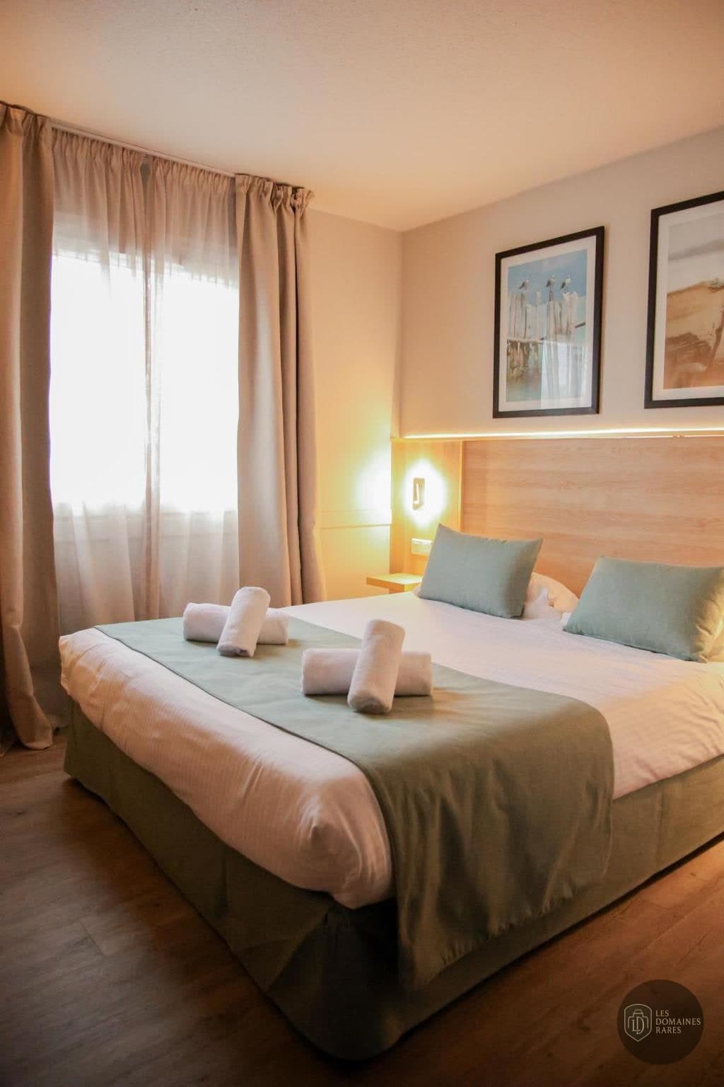 Chambre de l'hôtel Hôtel M Honfleur en Normandie - séminaire calvados