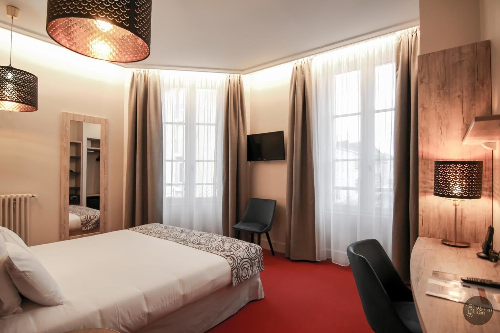 Chambre de l'hôtel Hôtel Montaigne Sarlat en Nouvelle-Aquitaine