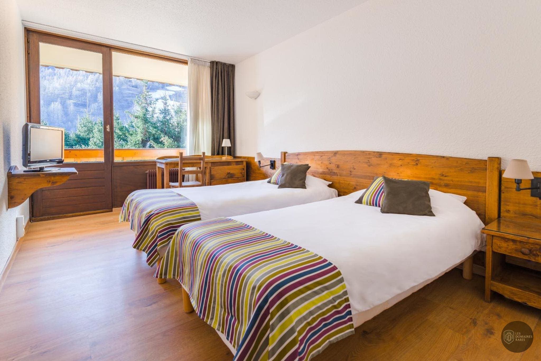 Chambre de l'hôtel Hôtel Plein Sud à Chantemerle en Provence-Alpes-Côte d'Azur - séminaire serre chevalier, france