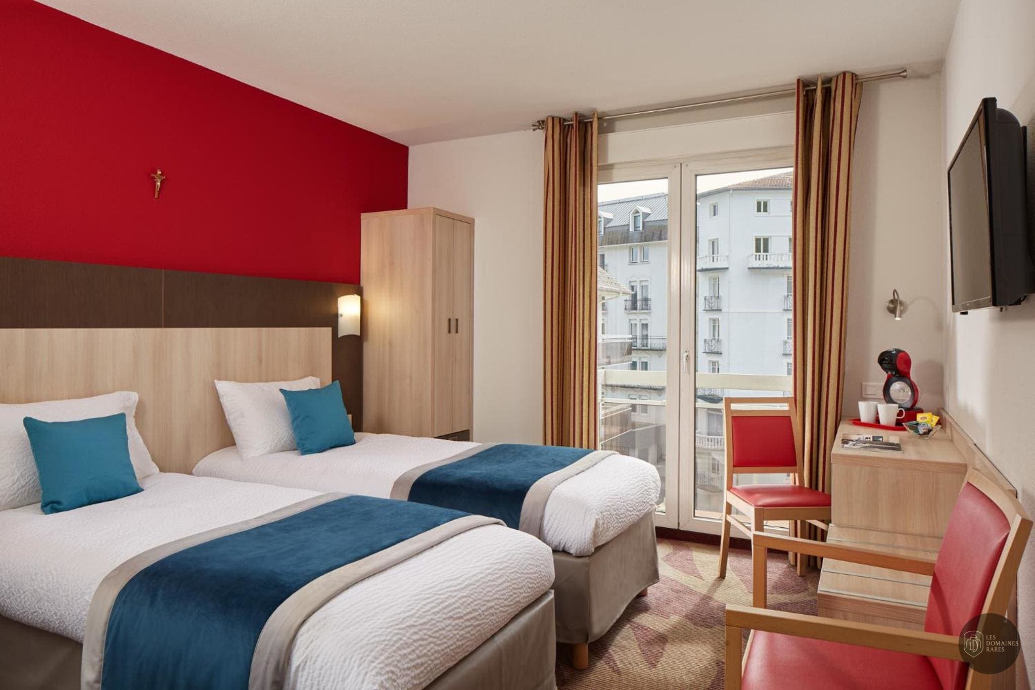 Chambre de l'hôtel Hôtel Roissy à Lourdes en Occitanie