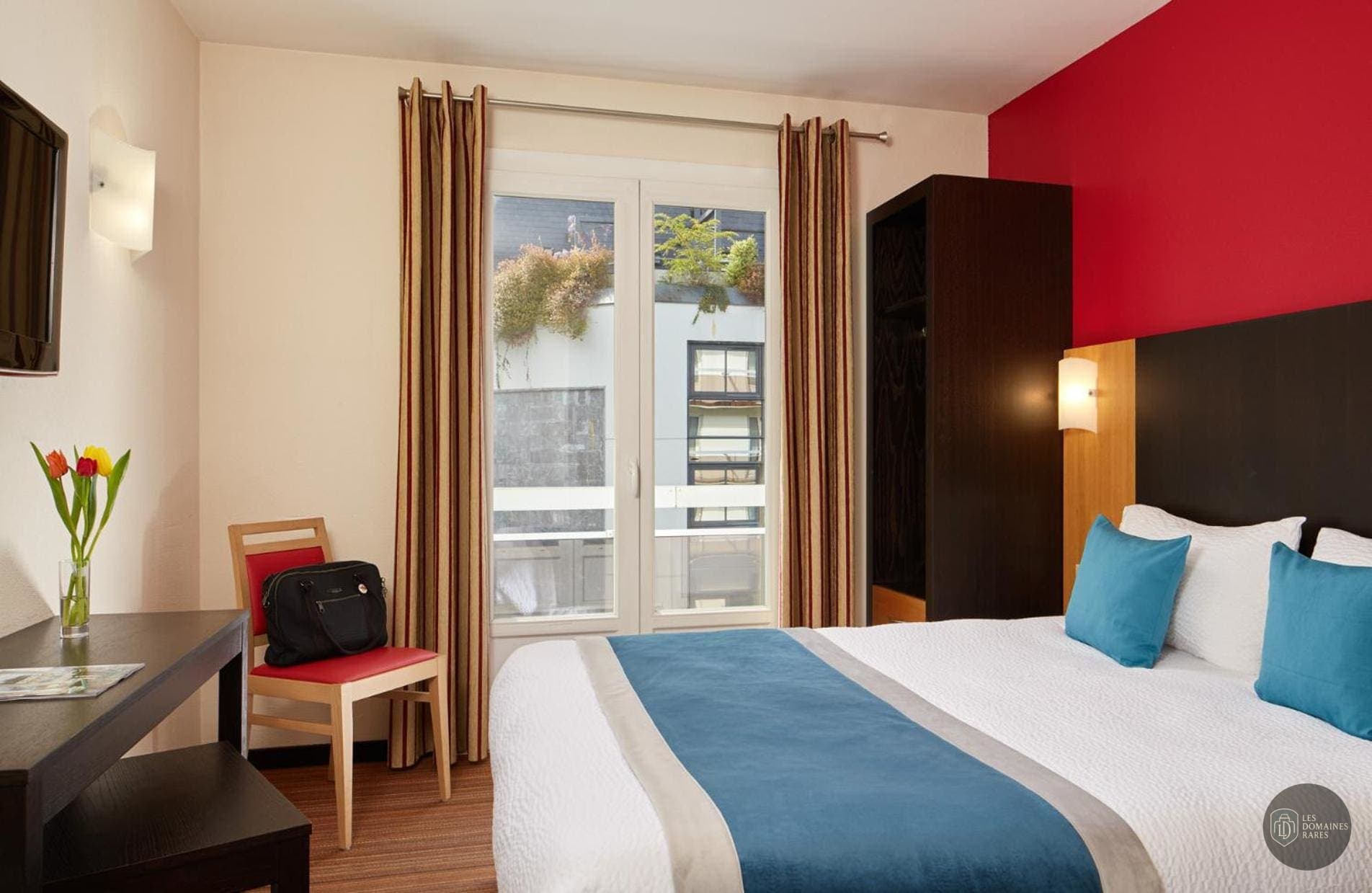 Chambre de l'hôtel Hôtel Roissy à Lourdes en Occitanie