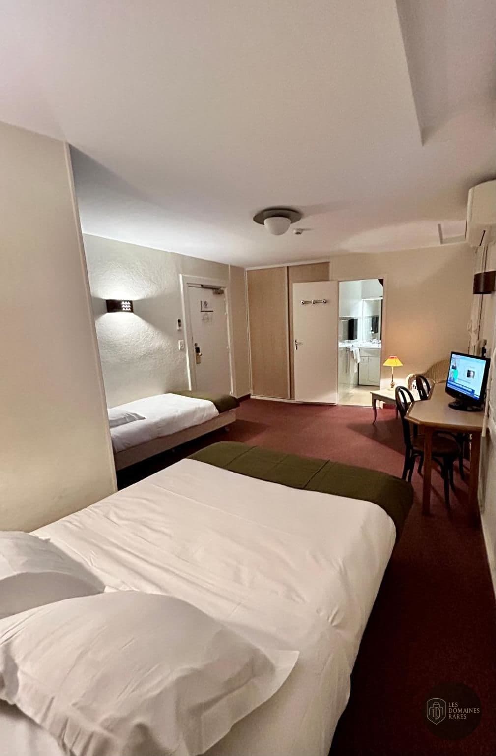 Chambre de l'hôtel Hôtel Teyssier à Uzerche en Nouvelle-Aquitaine
