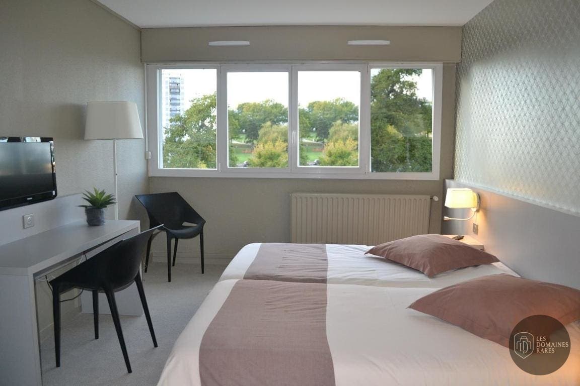 Chambre de l'hôtel Hôtel de Guyenne à Talence en Nouvelle-Aquitaine