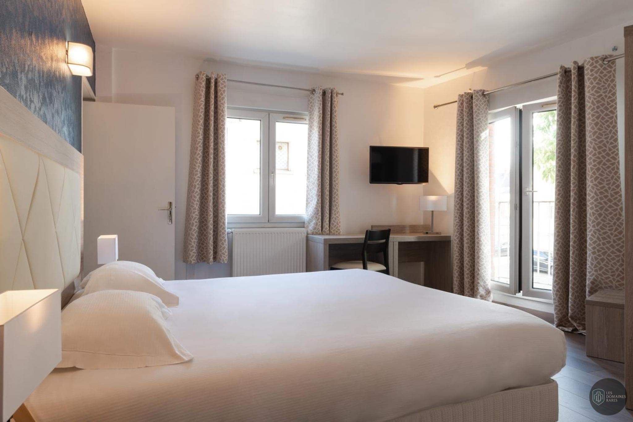Chambre de l'hôtel Hôtel de l'Orme à Evreux en Normandie