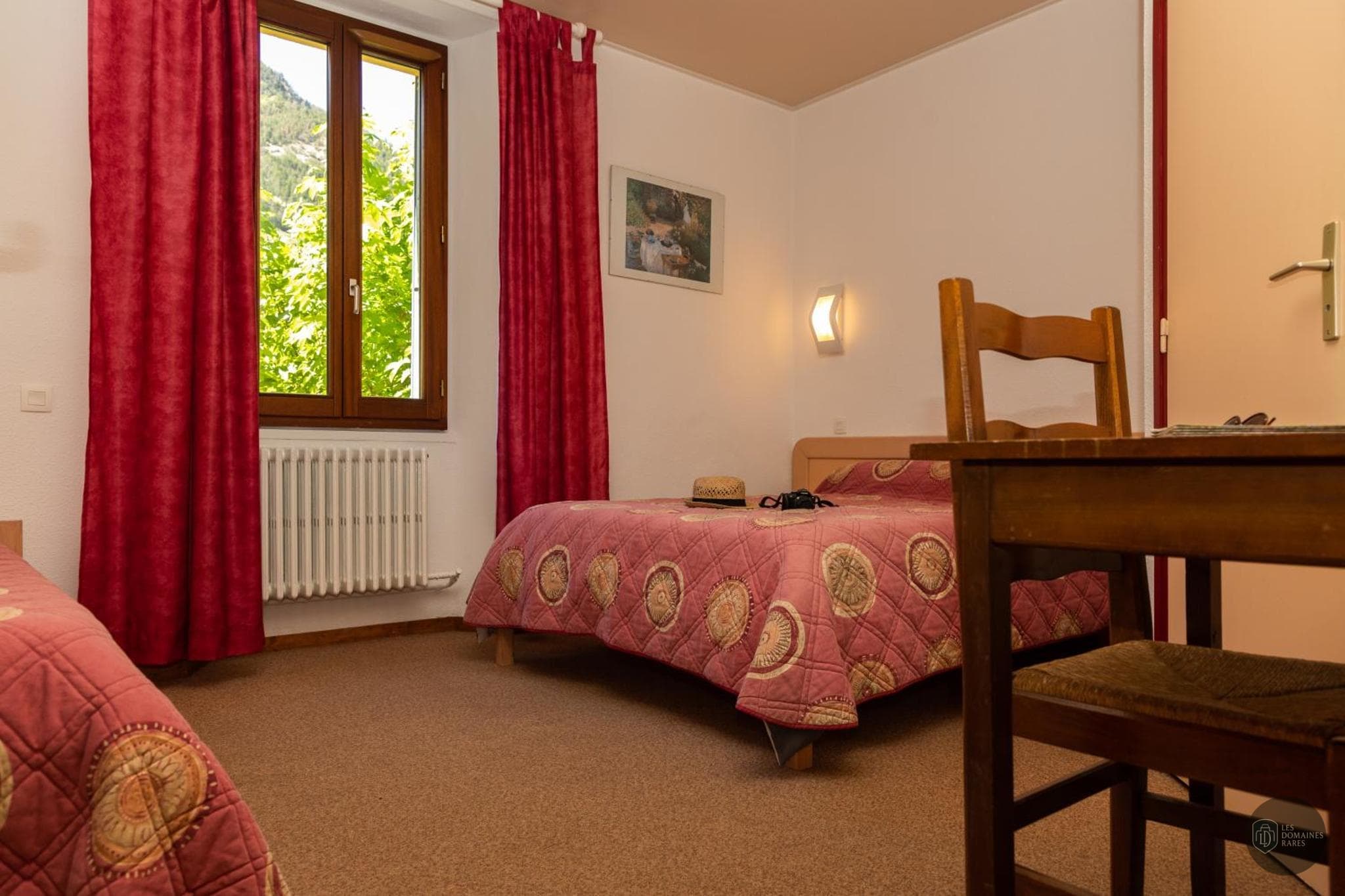 Chambre de l'hôtel Hôtel de la Mairie à Embrun en Provence-Alpes-Côte d'Azur - séminaire embrun, france