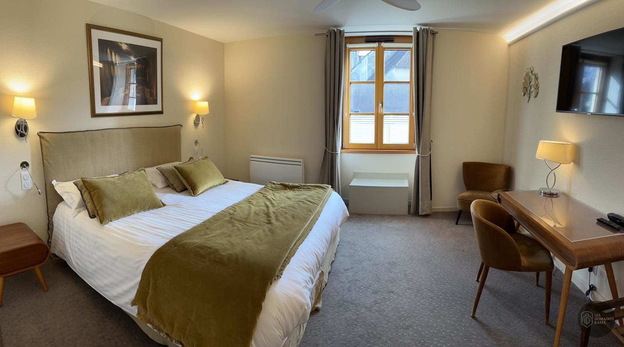 Chambre de l'hôtel Hôtel des Messageries à Saintes en Nouvelle-Aquitaine