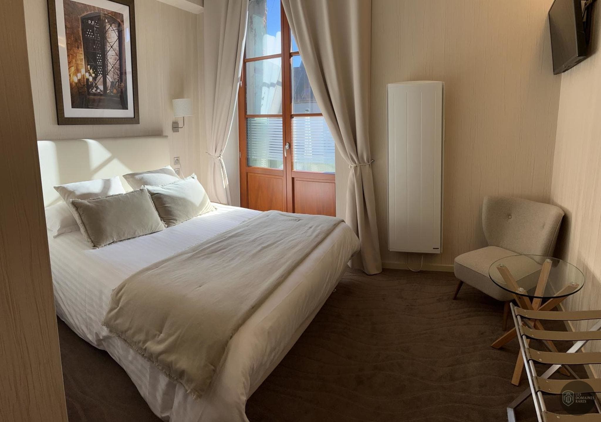 Chambre de l'hôtel Hôtel des Messageries à Saintes en Nouvelle-Aquitaine