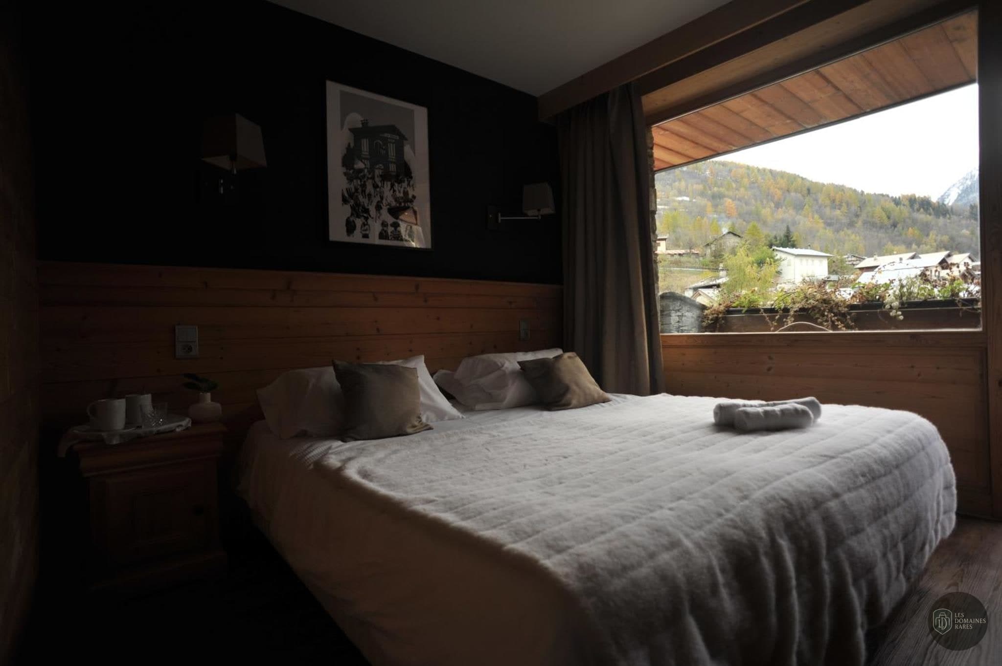 Chambre de l'hôtel Hôtel le Monal en Auvergne-Rhône-Alpes - séminaire sainte-foy-tarentaise, france