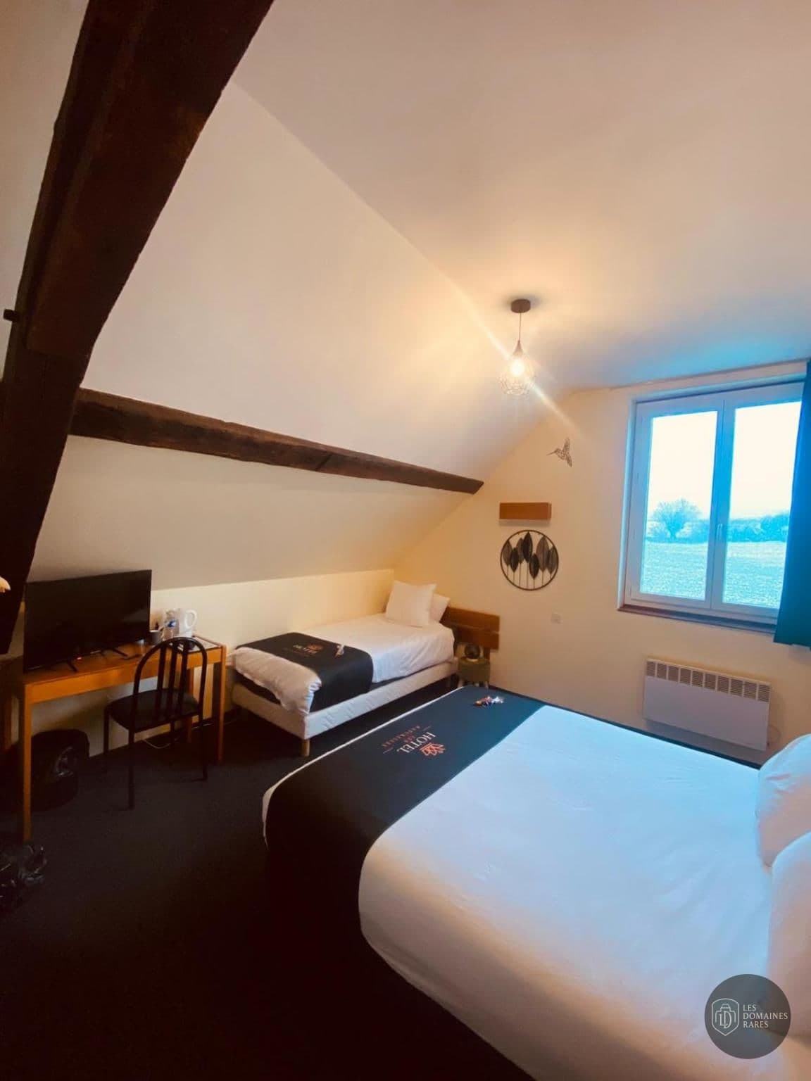 Chambre de l'hôtel Hôtel les Paturelles à Avesnelles en Hauts-de-France