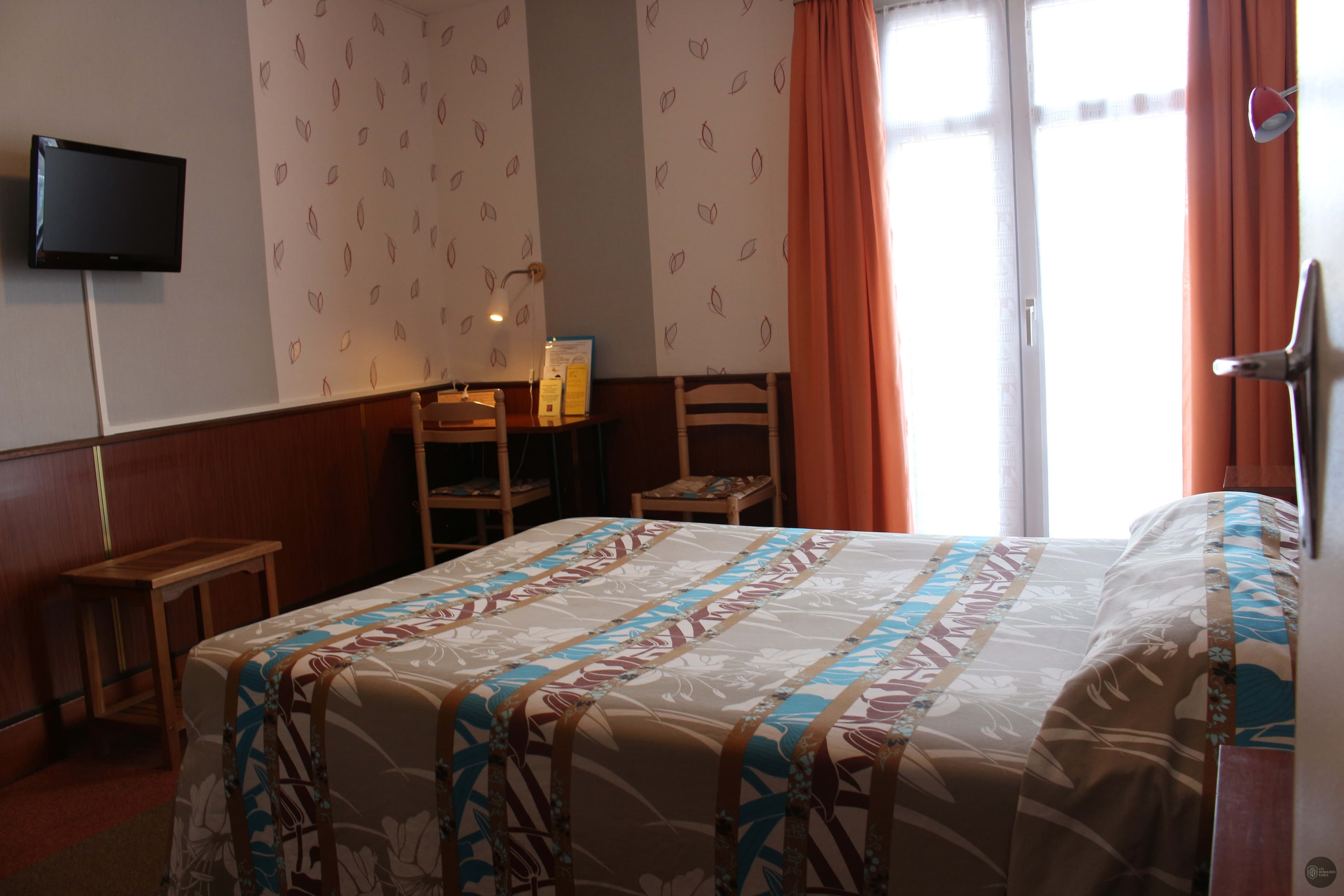 Chambre de l'hôtel Hotel Le France à Aubusson en Nouvelle-Aquitaine
