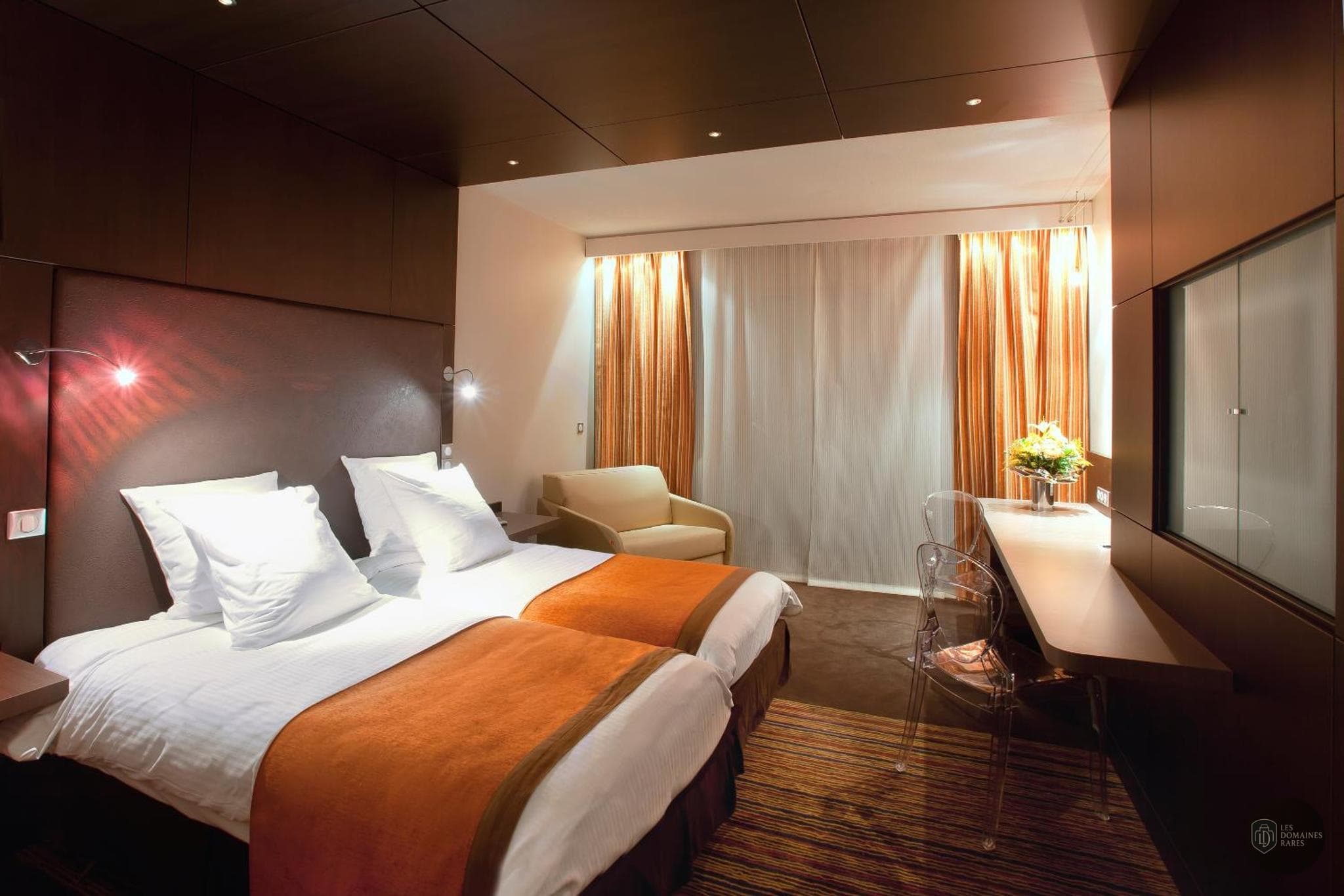 Chambre de l'hôtel Hotel Vatel Nîmes en Occitanie - séminaire nîmes france coordonnées gps latitude : 43.820665