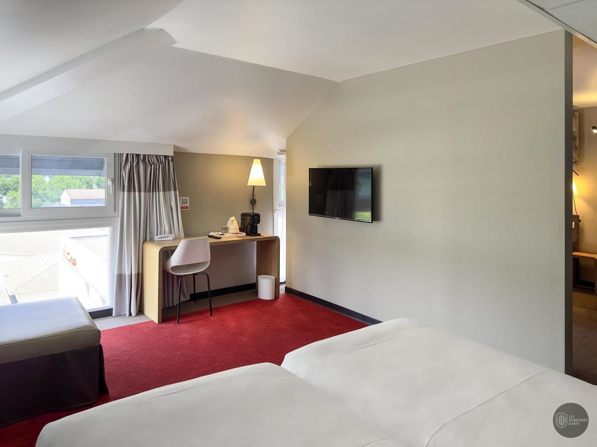 Chambre de l'hôtel Ibis Cahors en Occitanie - séminaire lot