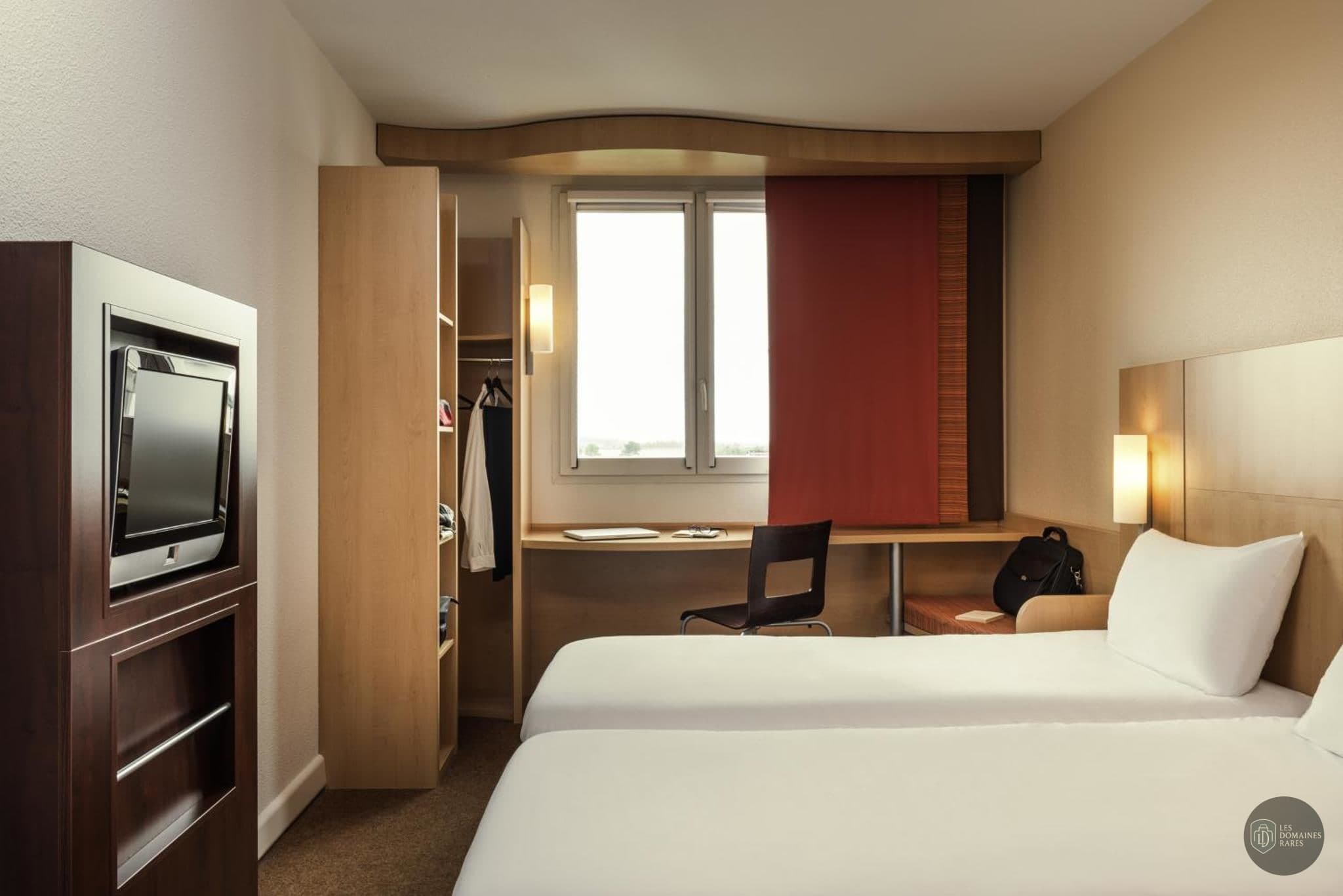 Chambre de l'hôtel Ibis Loriol le Pouzin à Le en Auvergne-Rhône-Alpes - séminaire le pouzin, france
