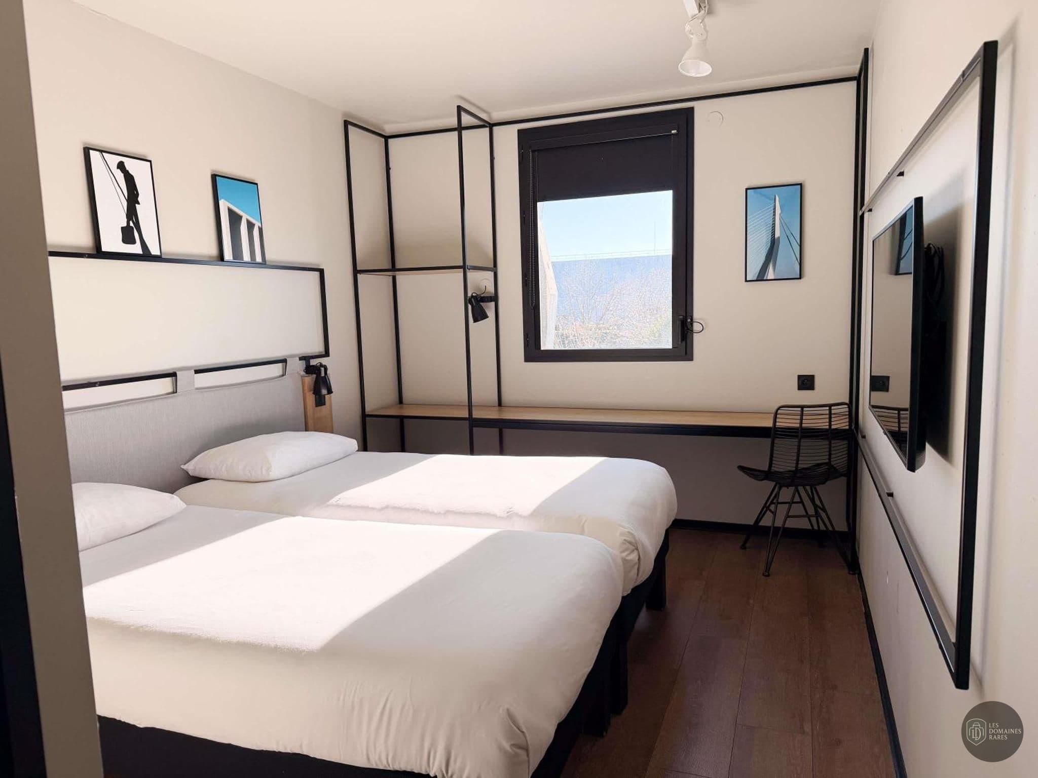 Chambre de l'hôtel Ibis Lunel Petite Camargue à Lunel en Occitanie - séminaire hérault