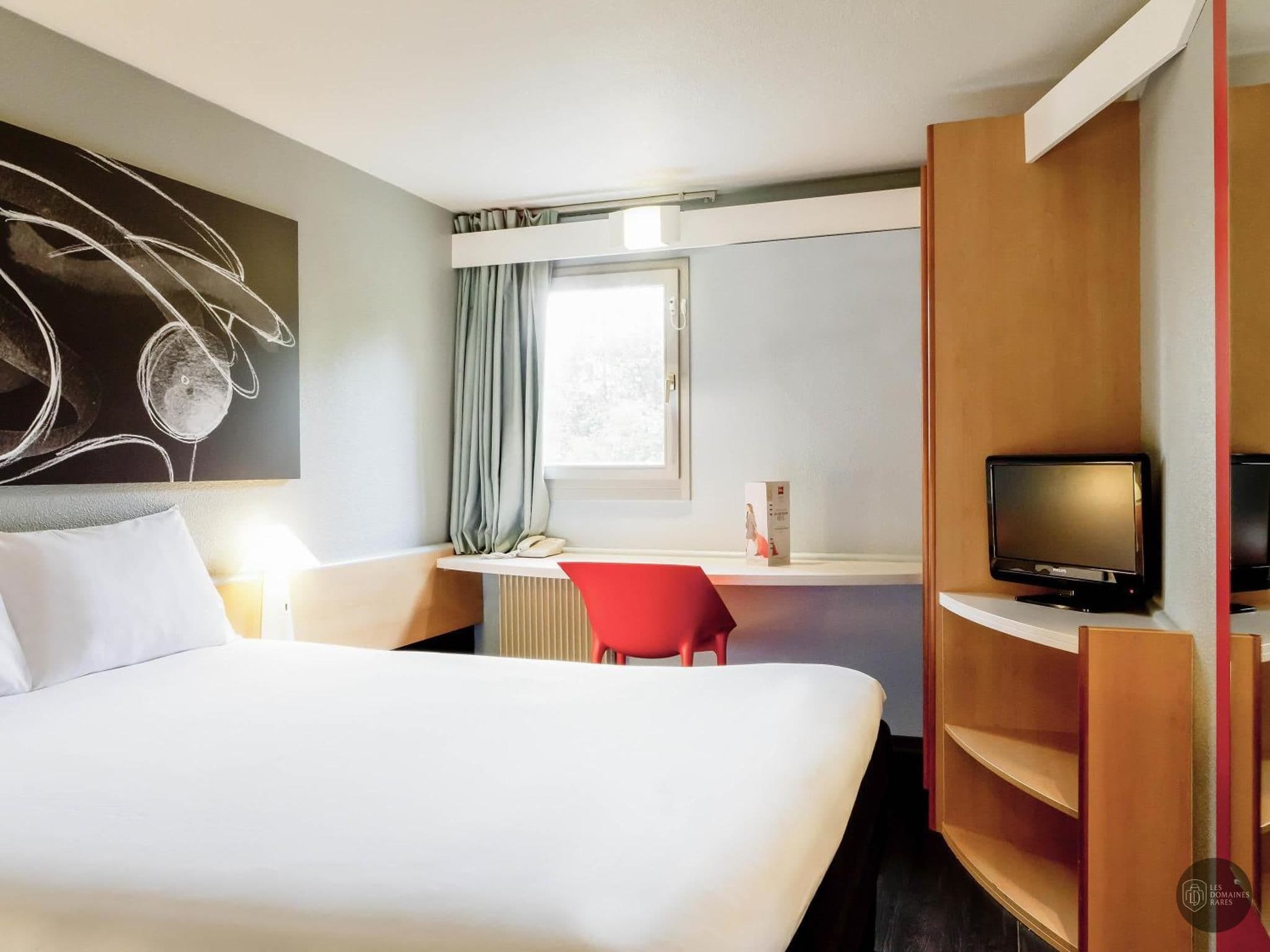 Chambre de l'hôtel Ibis Lyon Nord à Dardilly en Auvergne-Rhône-Alpes - séminaire dardilly