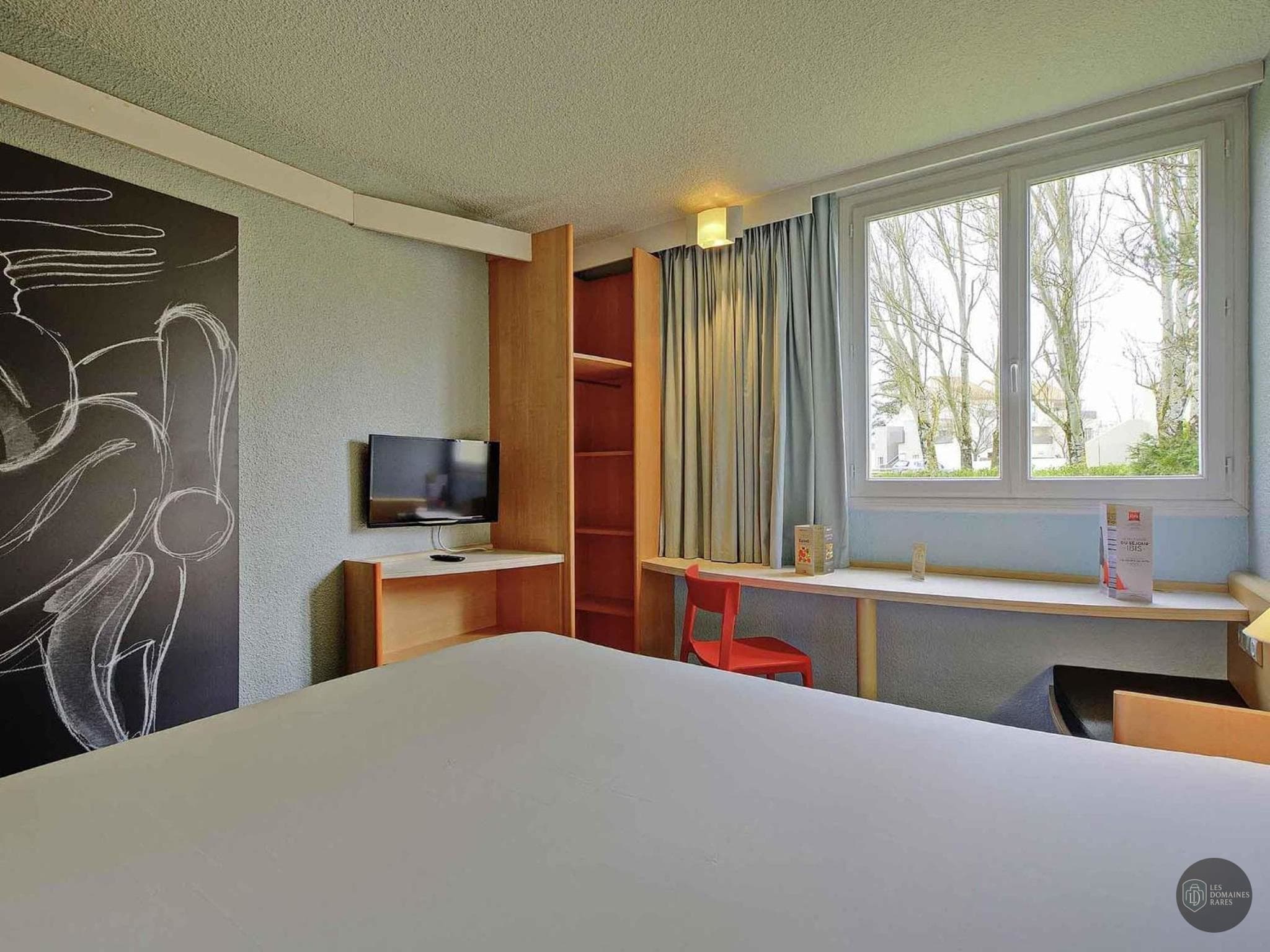 Chambre de l'hôtel Ibis Poitiers Beaulieu à Poitiers en Nouvelle-Aquitaine