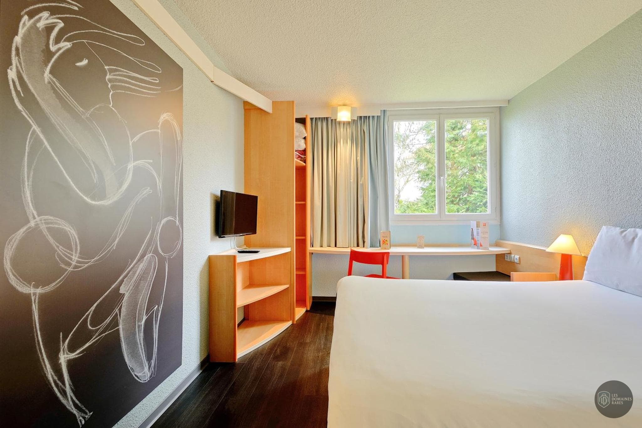 Chambre de l'hôtel Ibis Poitiers Beaulieu à Poitiers en Nouvelle-Aquitaine
