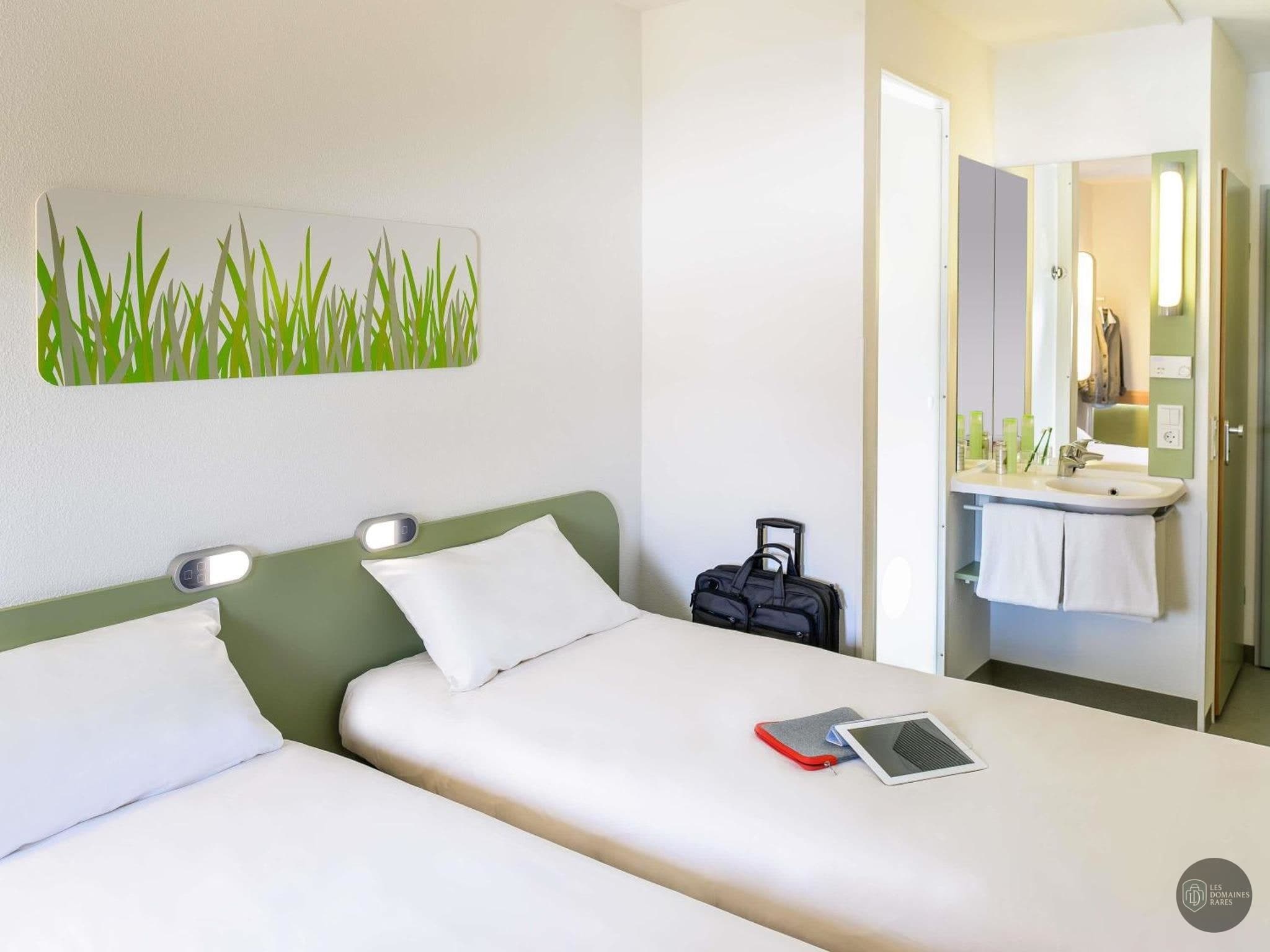 Chambre de l'hôtel Ibis Roanne à Le en Auvergne-Rhône-Alpes