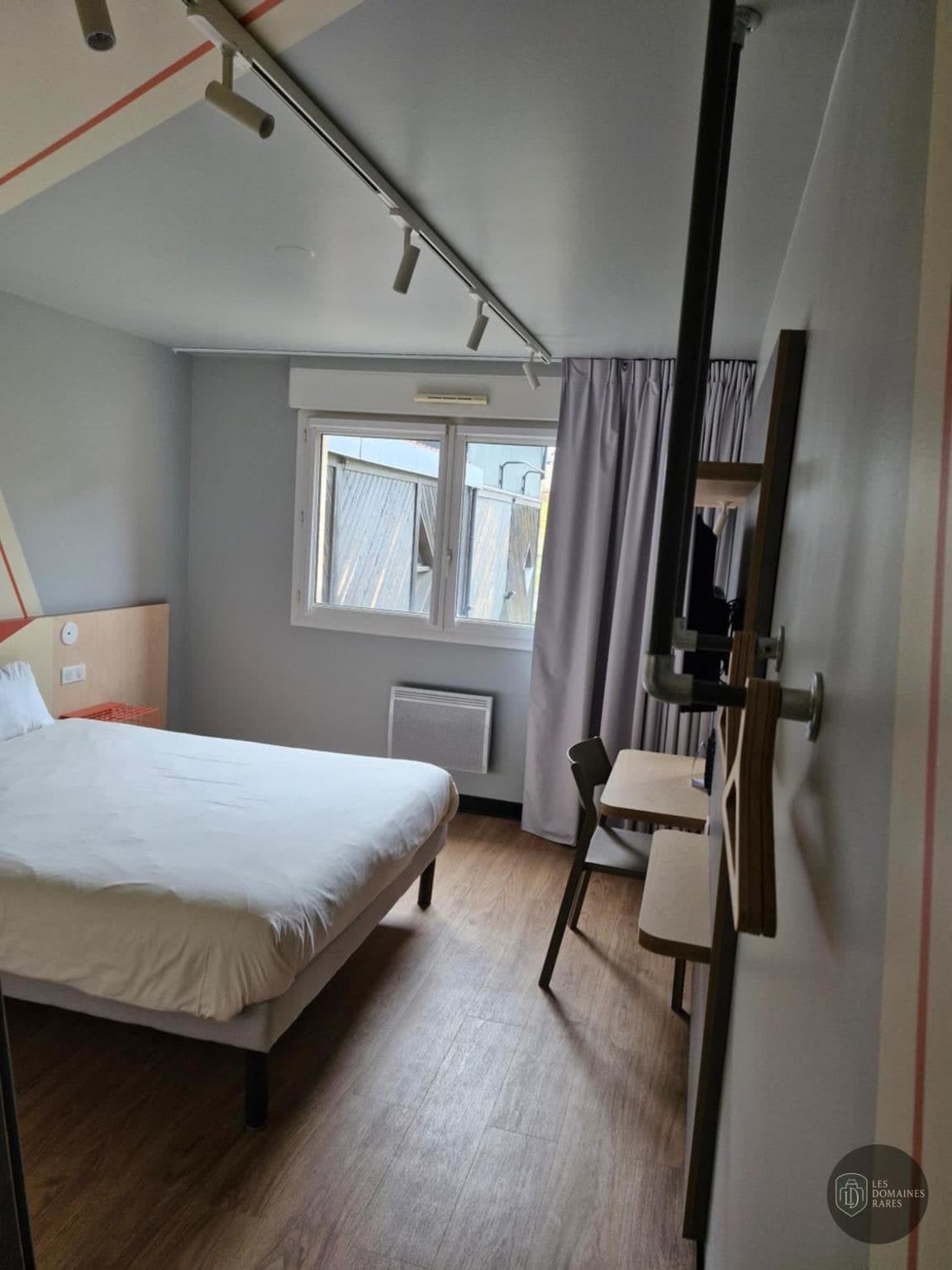 Chambre de l'hôtel Ibis Saint-Die-des-Vosges en Grand Est